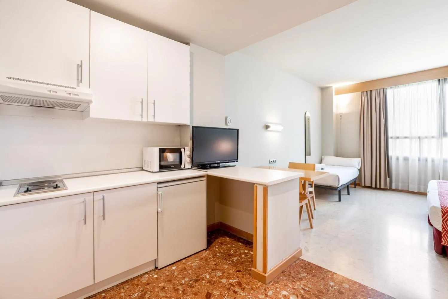 Kitchen or kitchenette in Aparthotel Exe Campus San Mamés