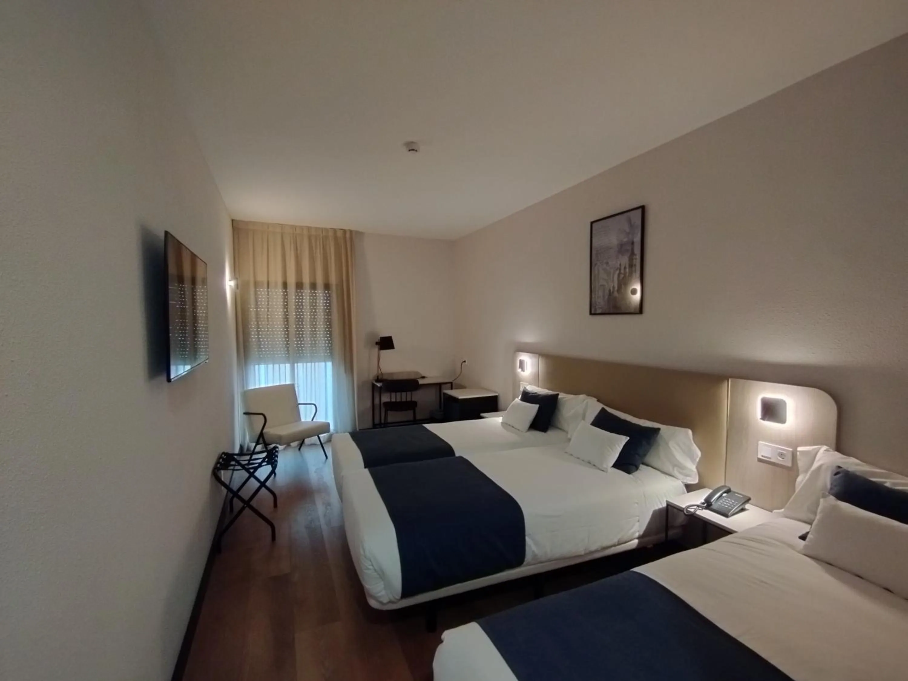 Bed in Hotel Don Jaime 54