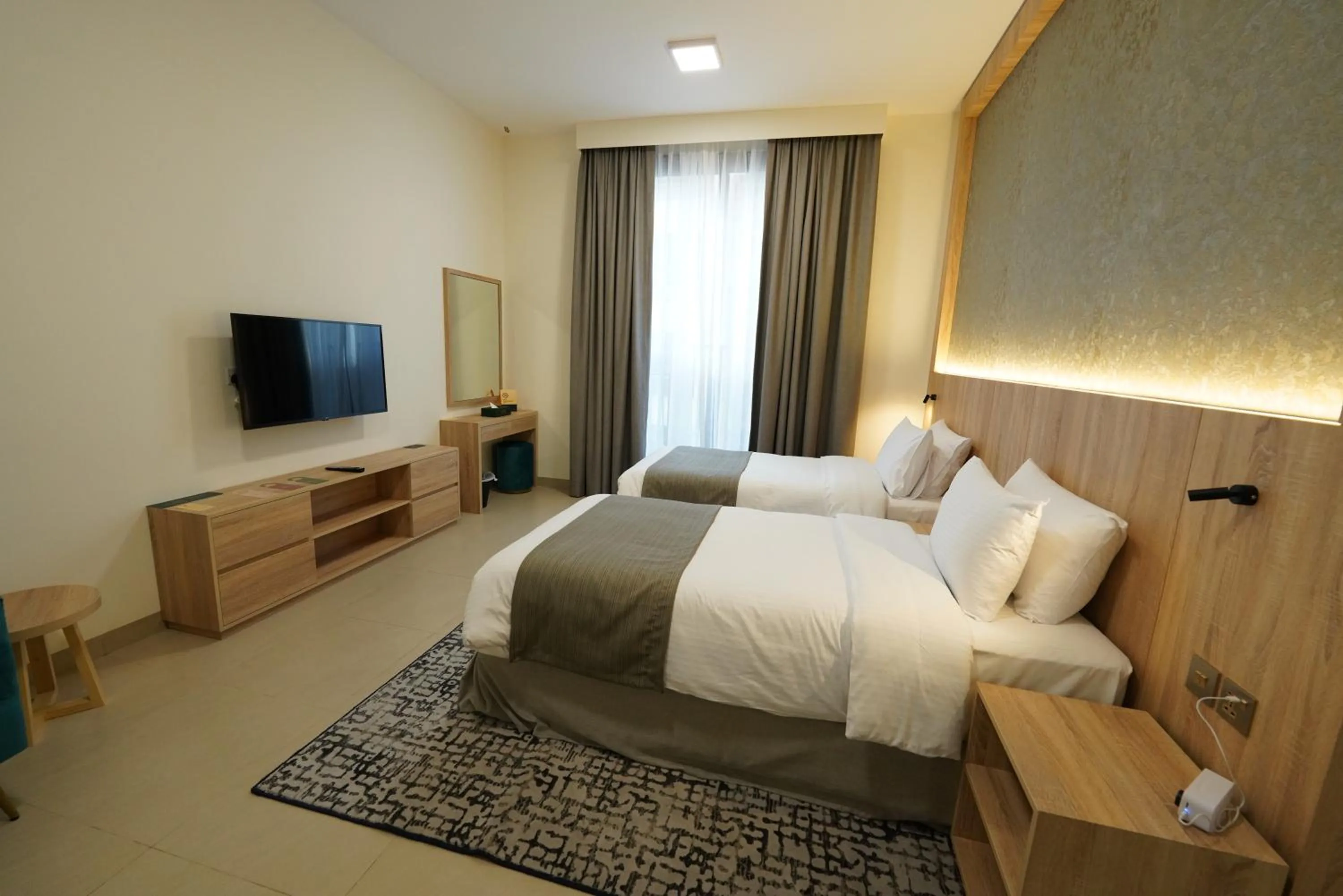 Bed in Azur Regency Hotel Apartments