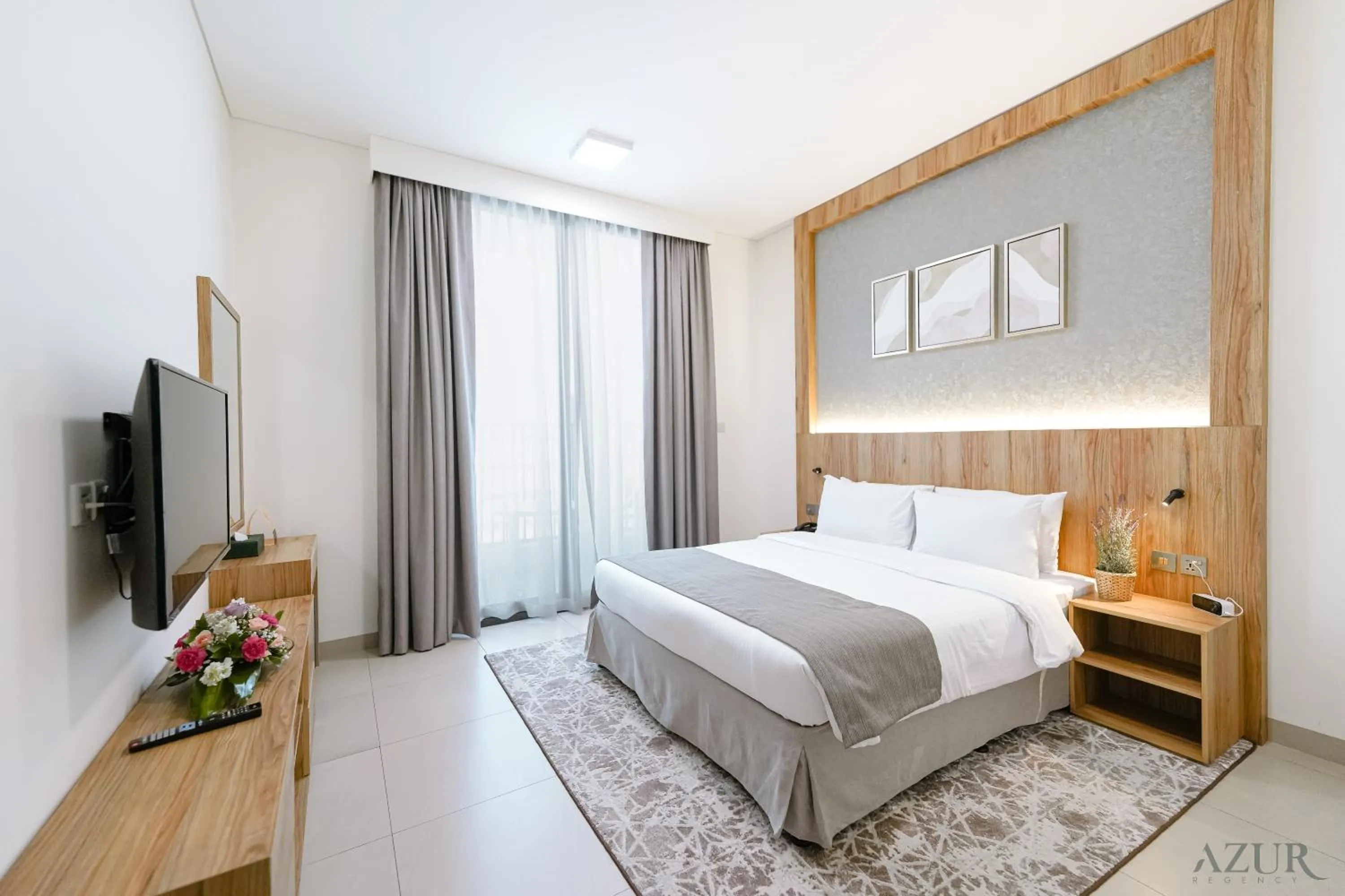 Bed in Azur Regency Hotel Apartments