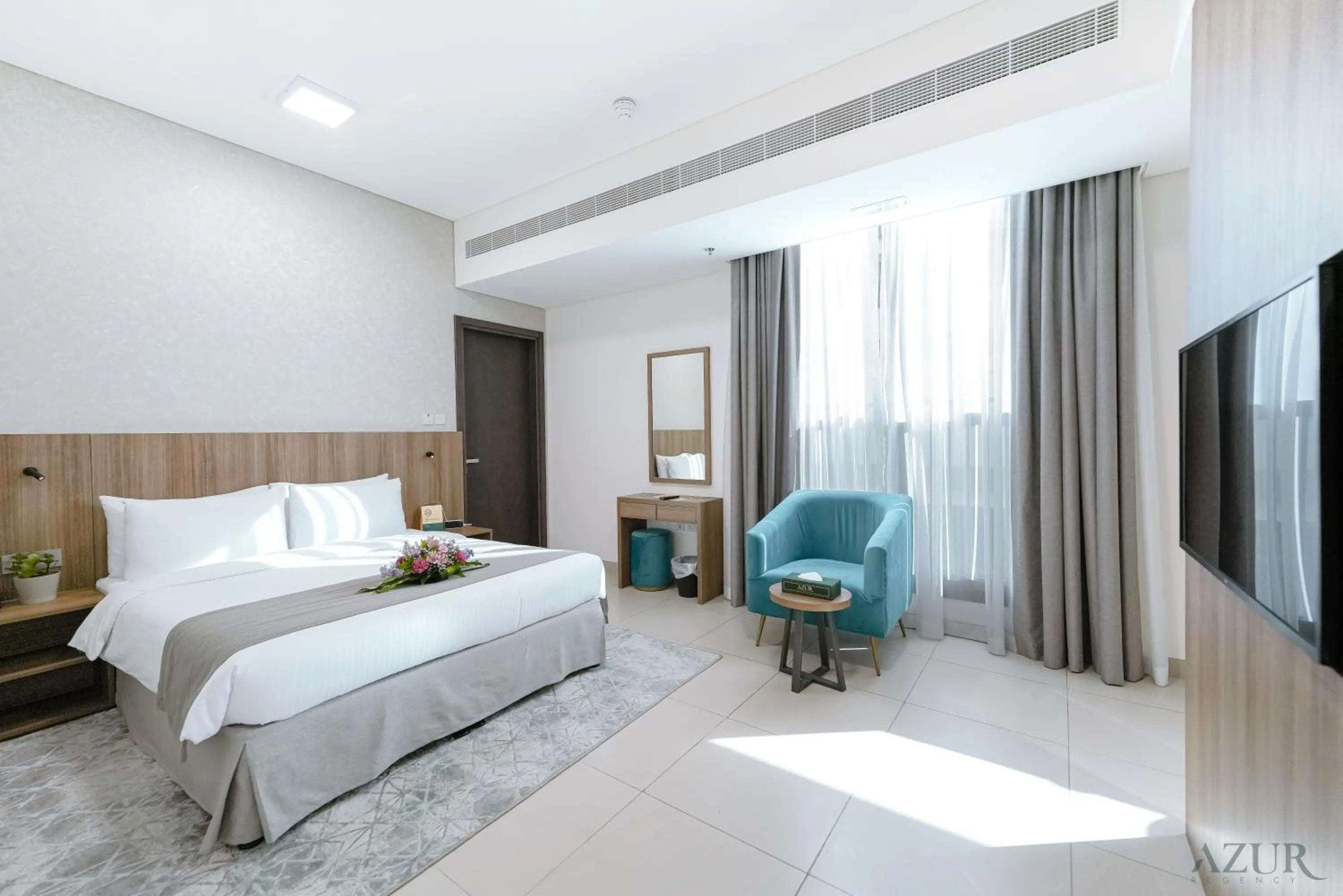 Bed in Azur Regency Hotel Apartments