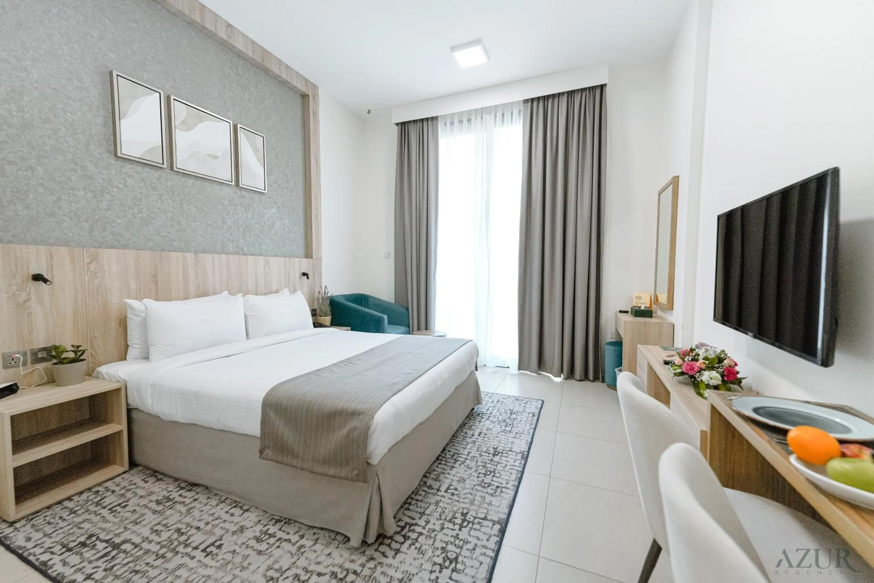 Bed in Azur Regency Hotel Apartments