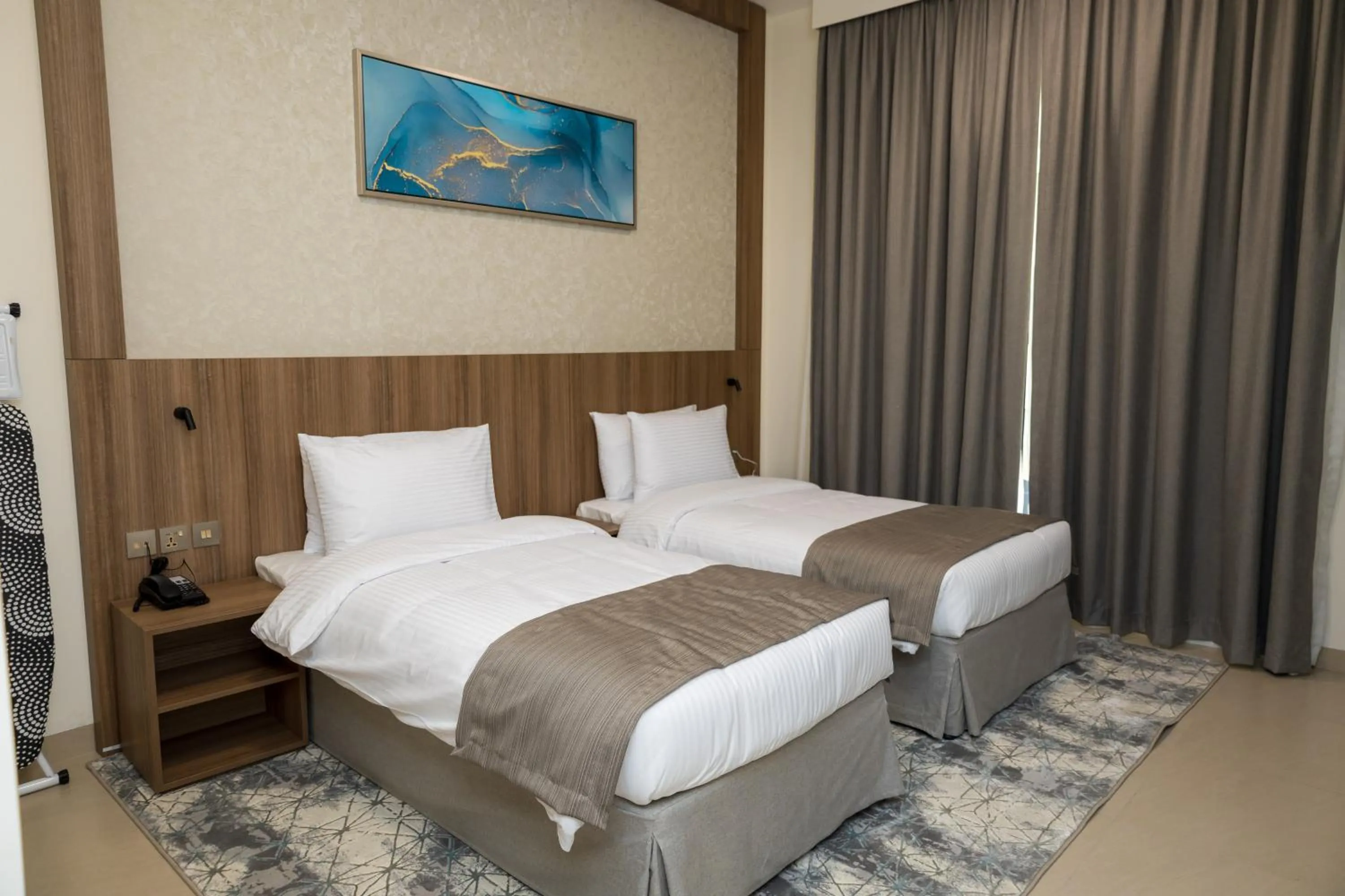 Bed in Azur Regency Hotel Apartments