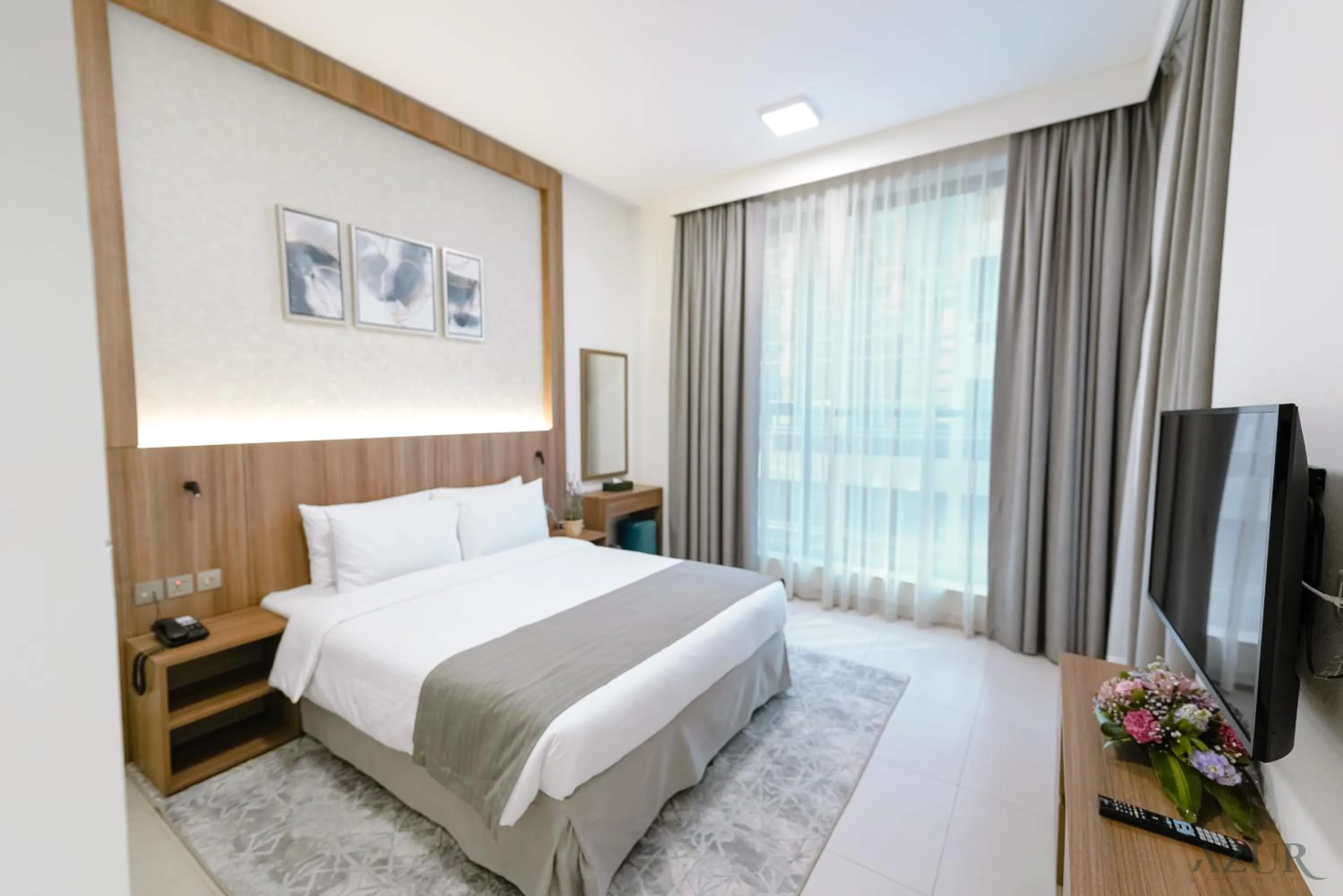 Bed in Azur Regency Hotel Apartments