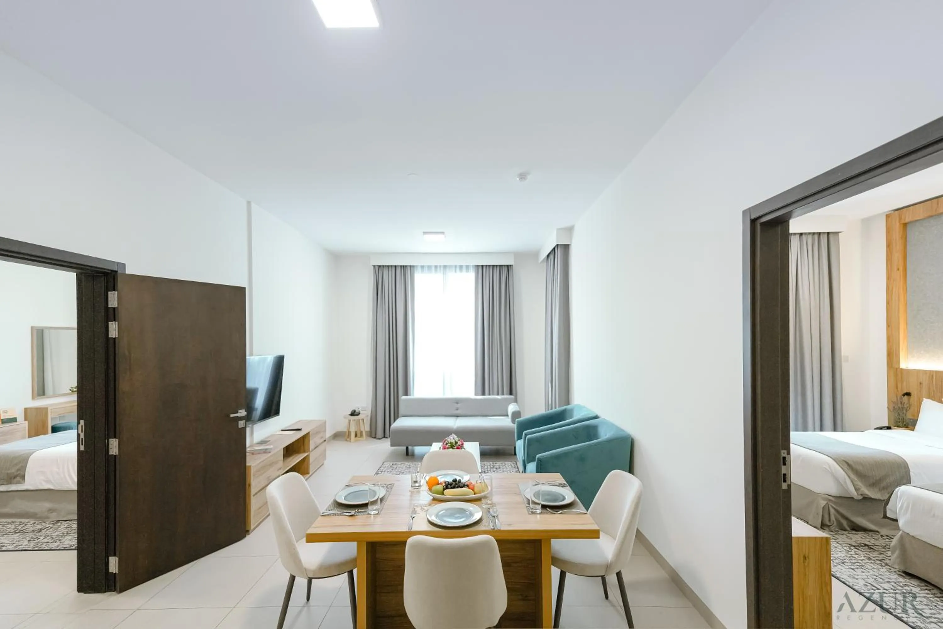 Bed in Azur Regency Hotel Apartments