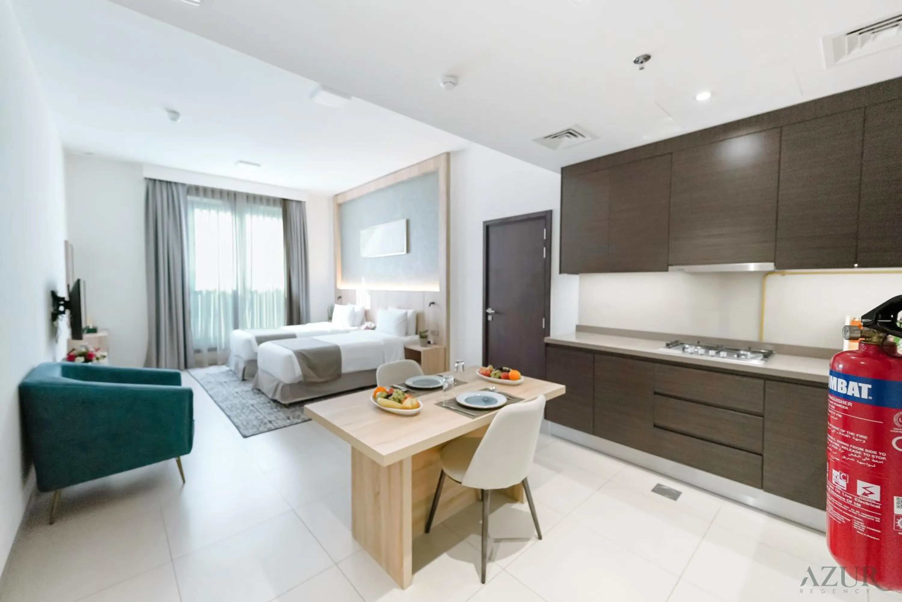 Bed in Azur Regency Hotel Apartments