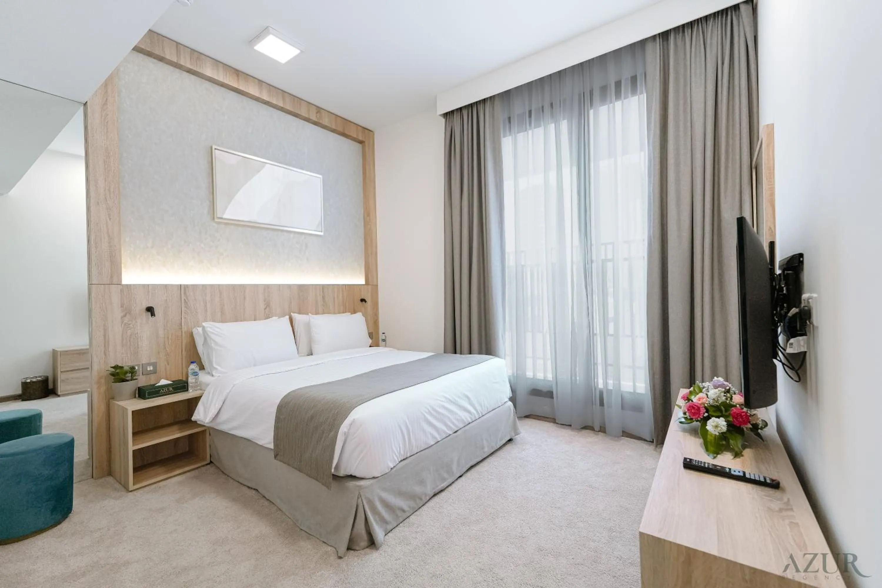 Bed in Azur Regency Hotel Apartments