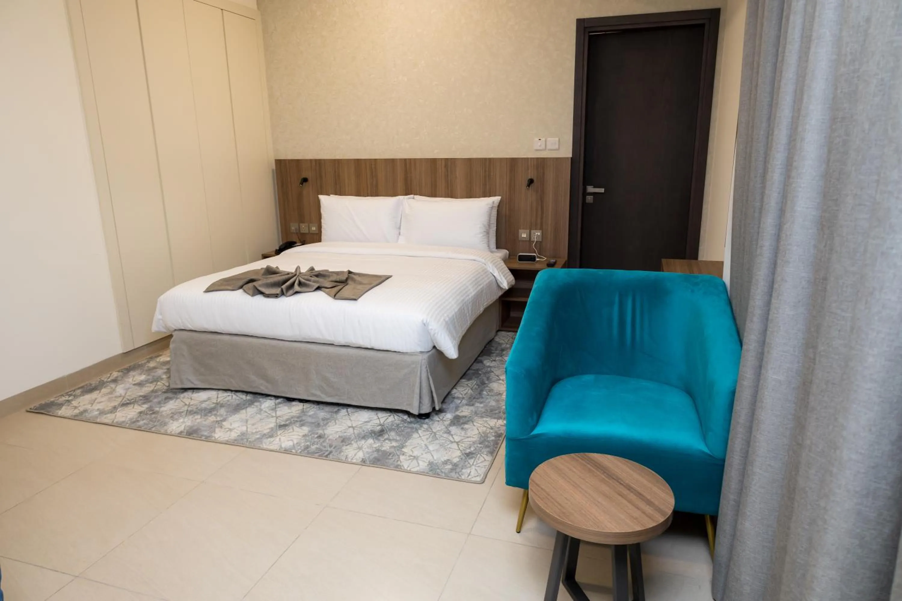 Bed in Azur Regency Hotel Apartments