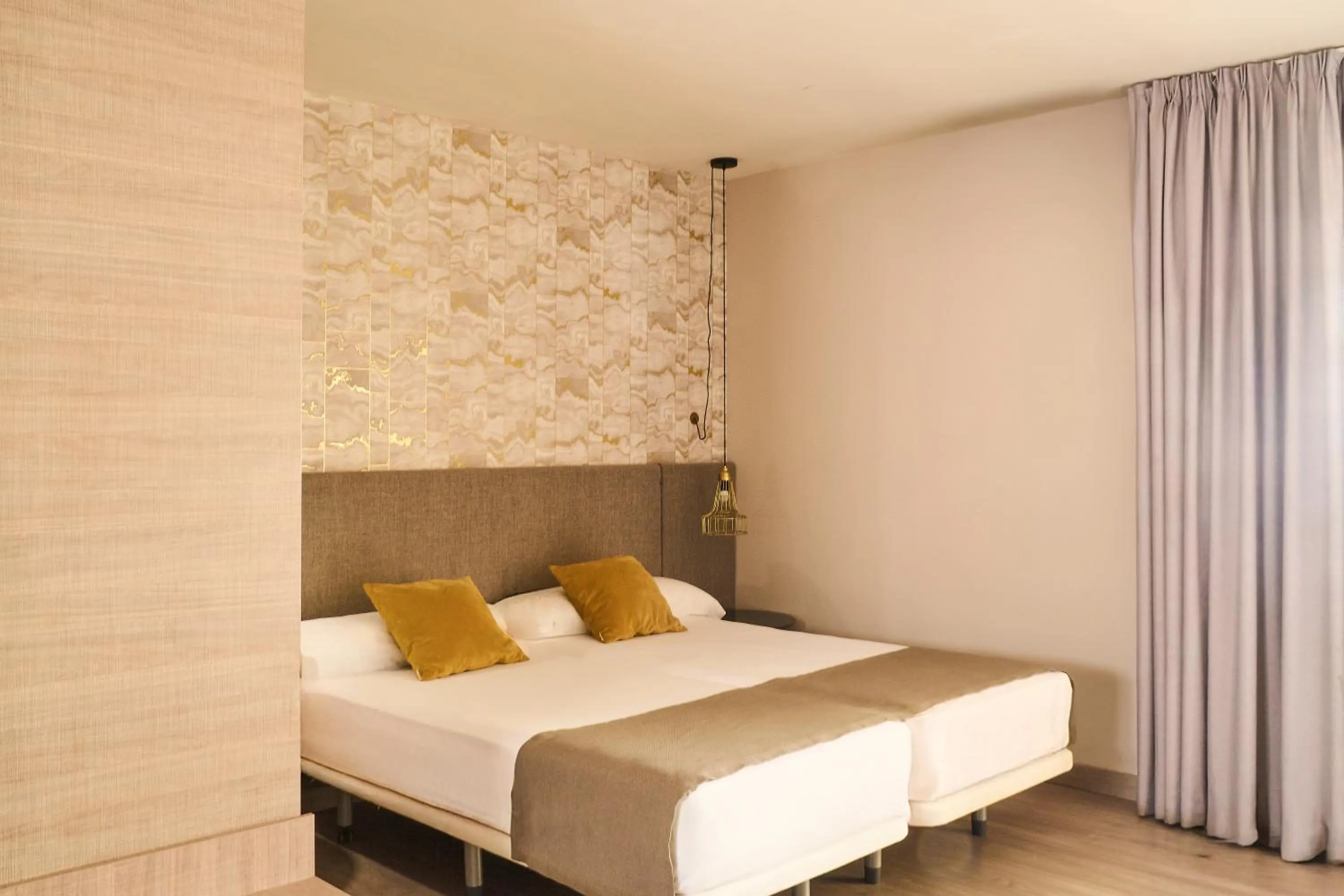 Bed in Ona Marbella Inn