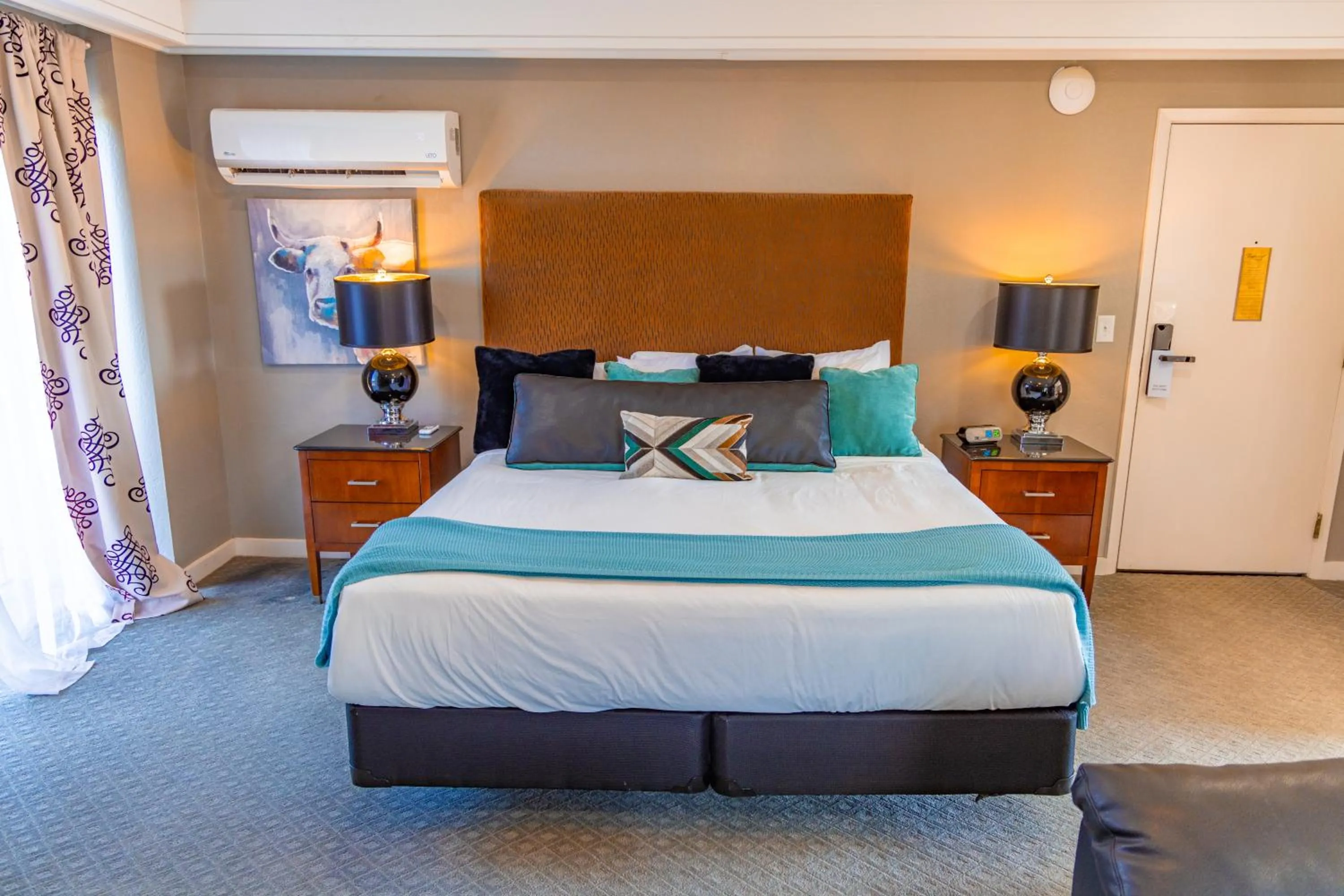 Bed in Tanglewood Resort on Lake Texoma, an Ascend Collection Resort