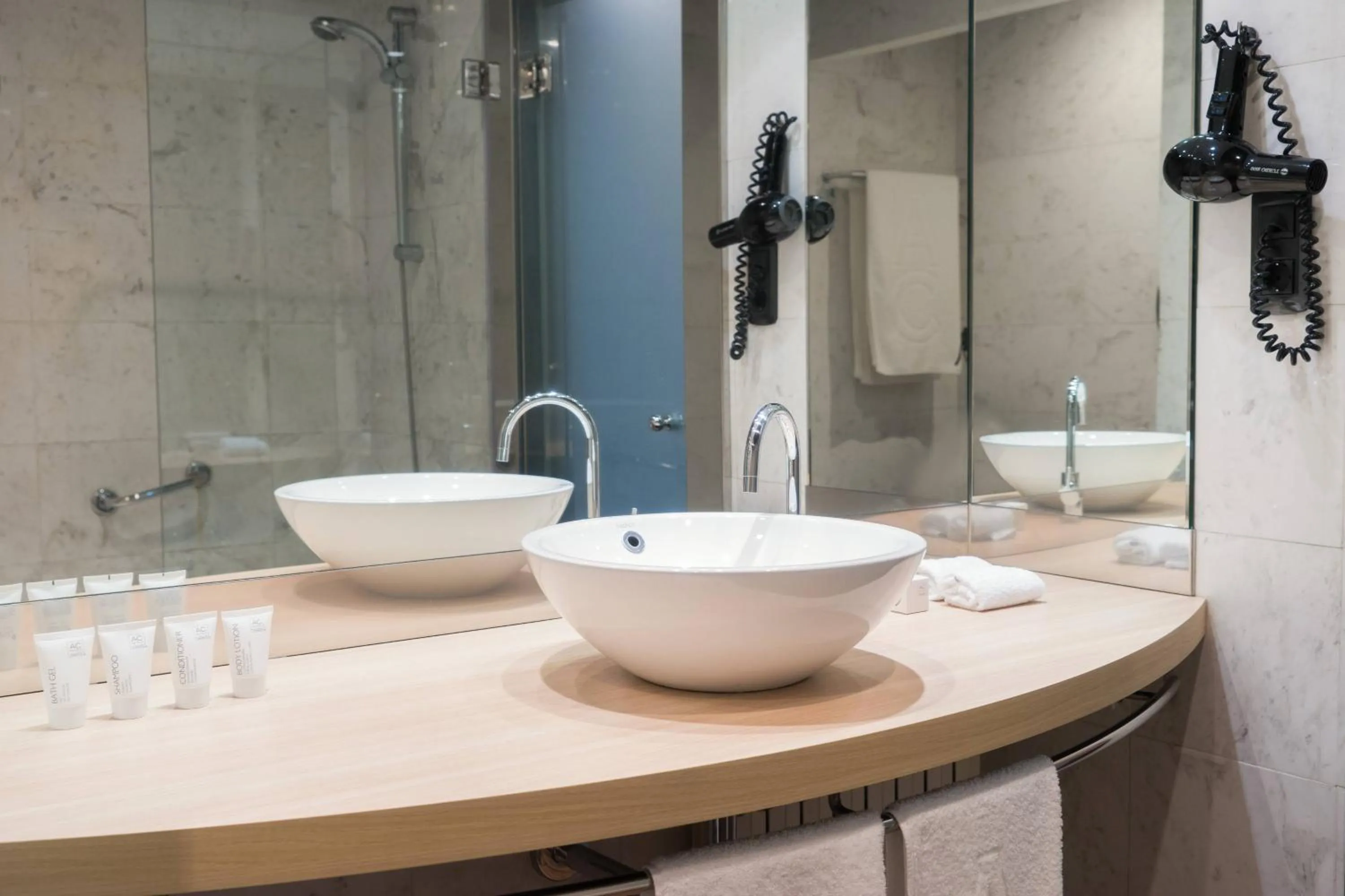 Bathroom in AC Hotel Ciudad de Sevilla by Marriott