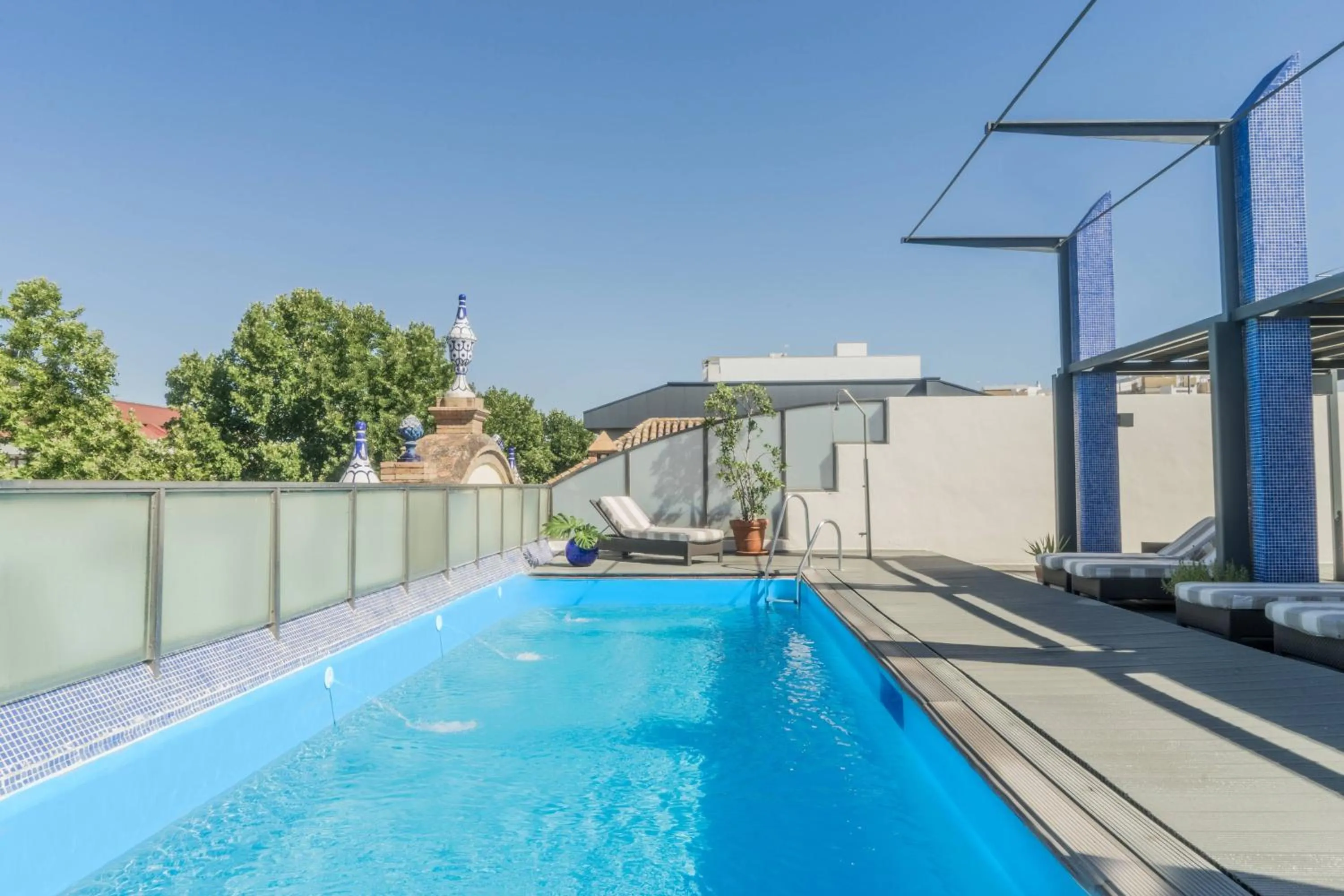 Swimming pool in AC Hotel Ciudad de Sevilla by Marriott