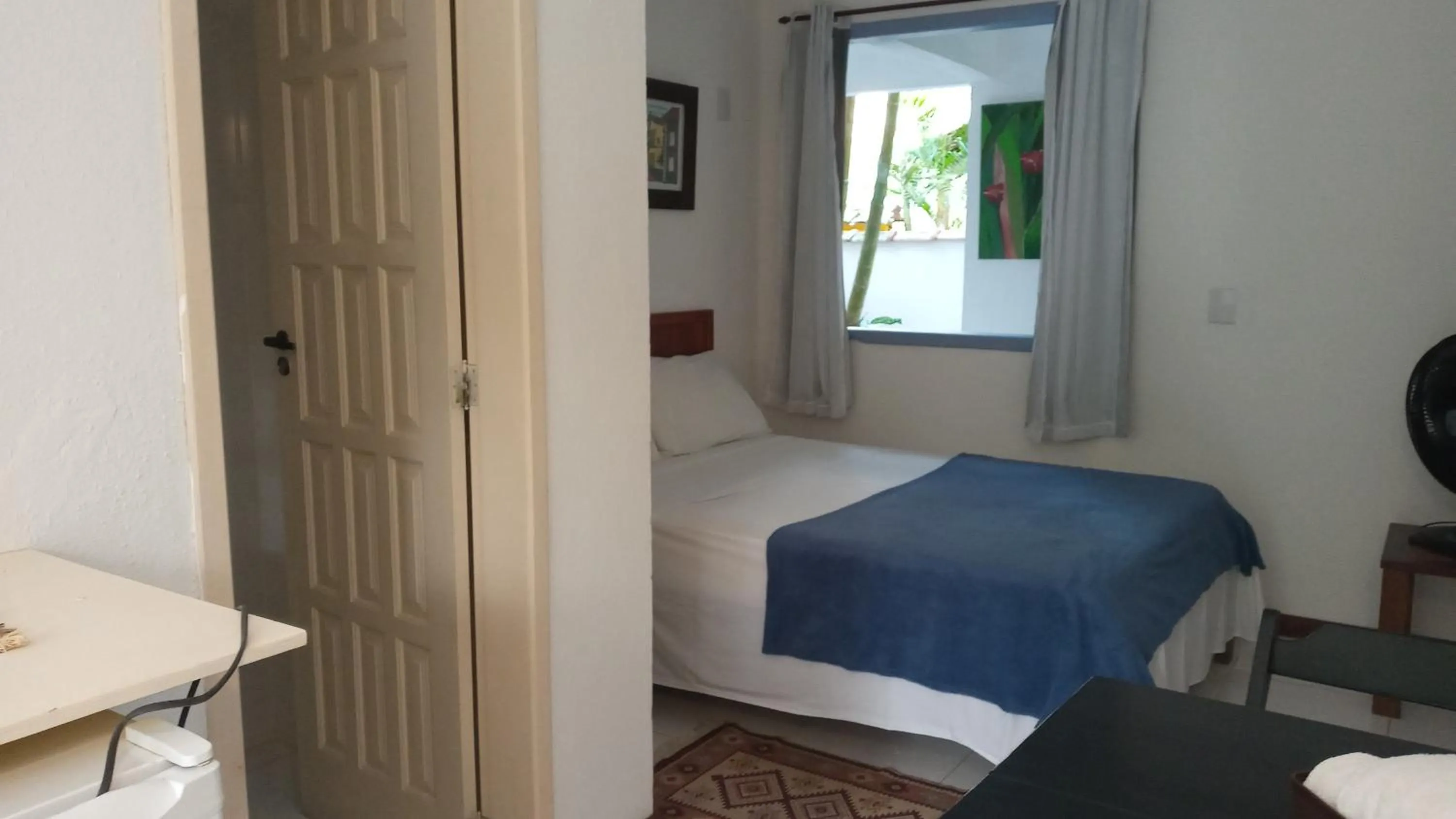 Photo of the whole room, Bed in Pitanga Ilha Grande