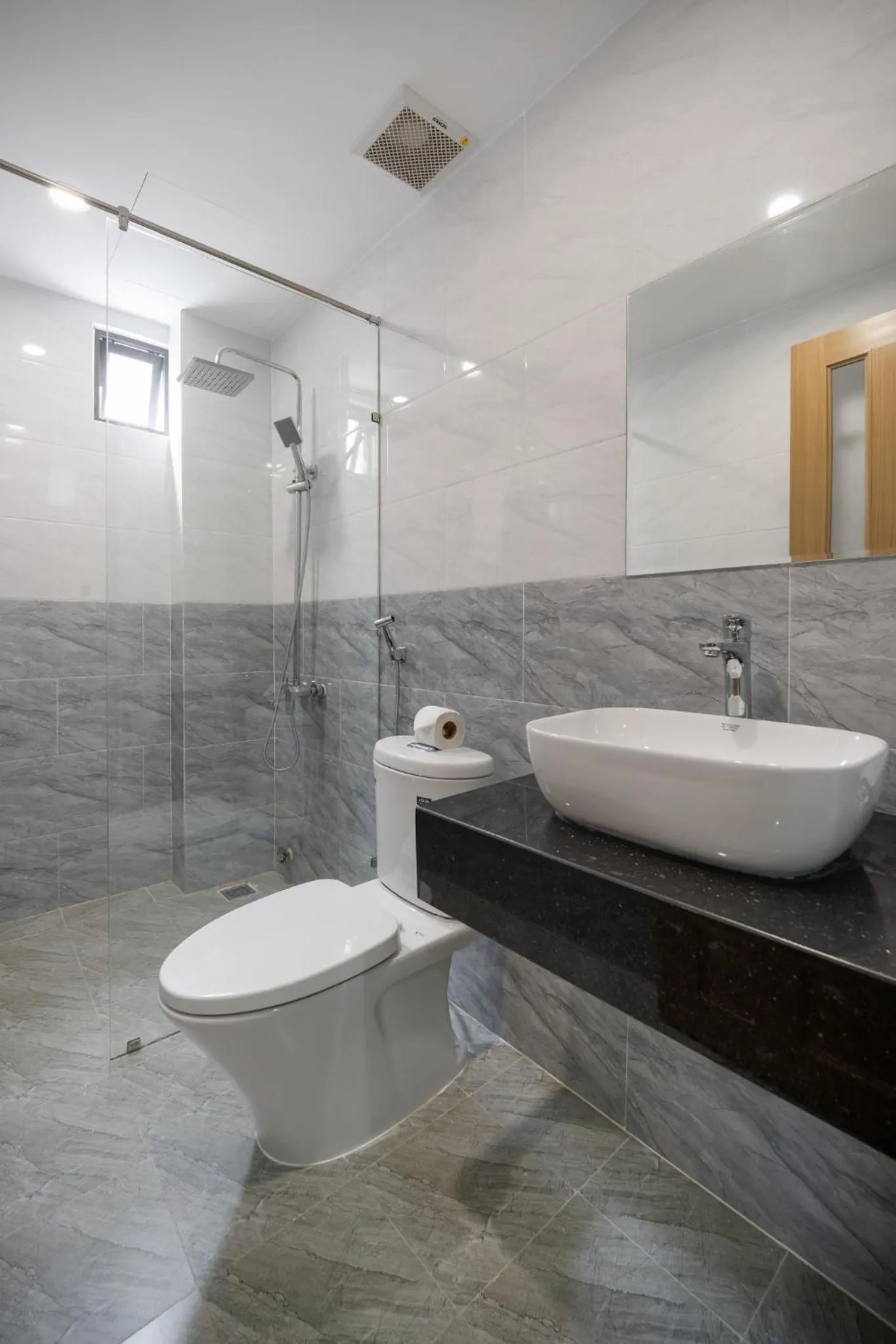 Toilet in Melody Hotel