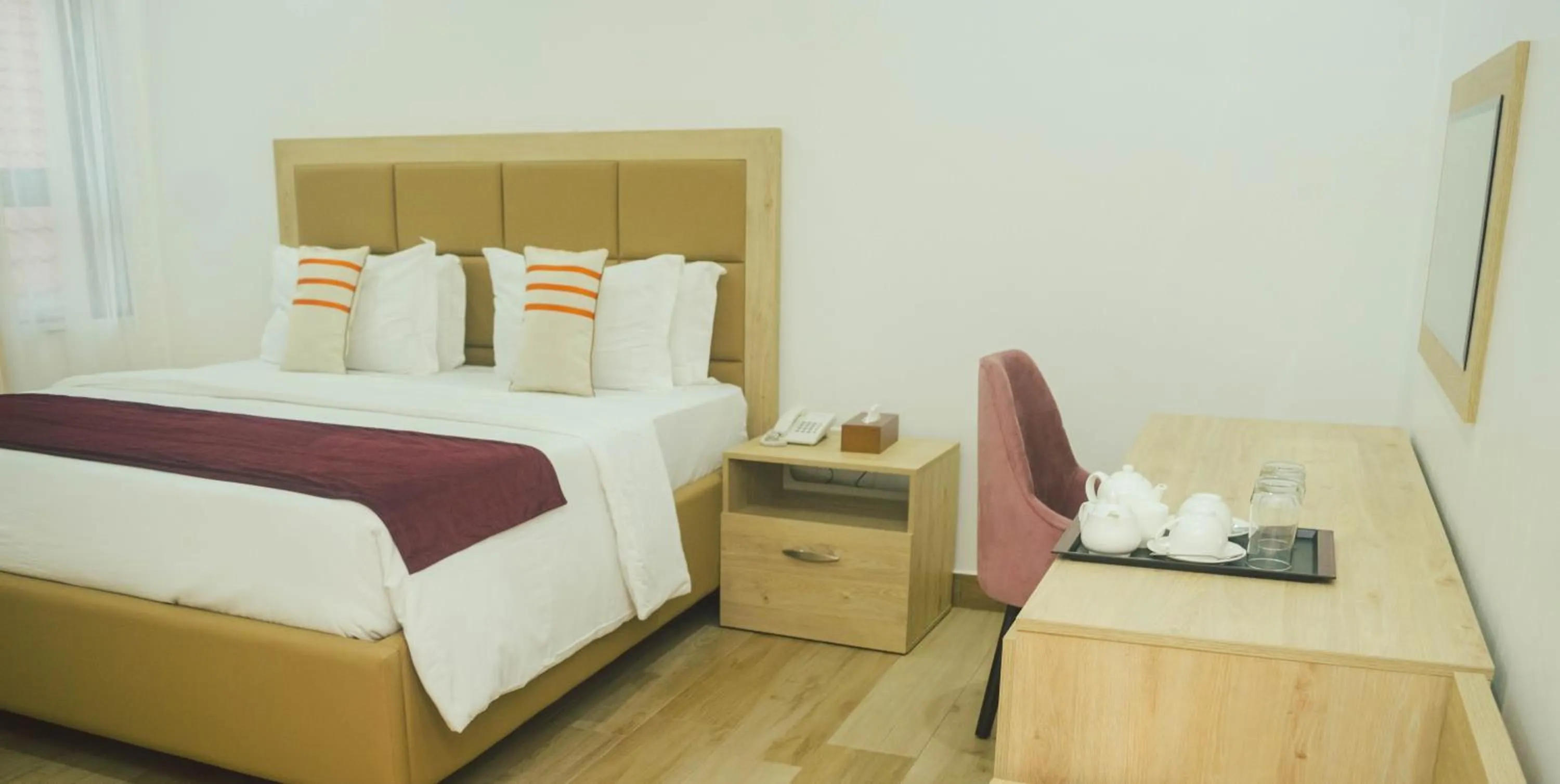 Bed in Quest Boutique Hotel