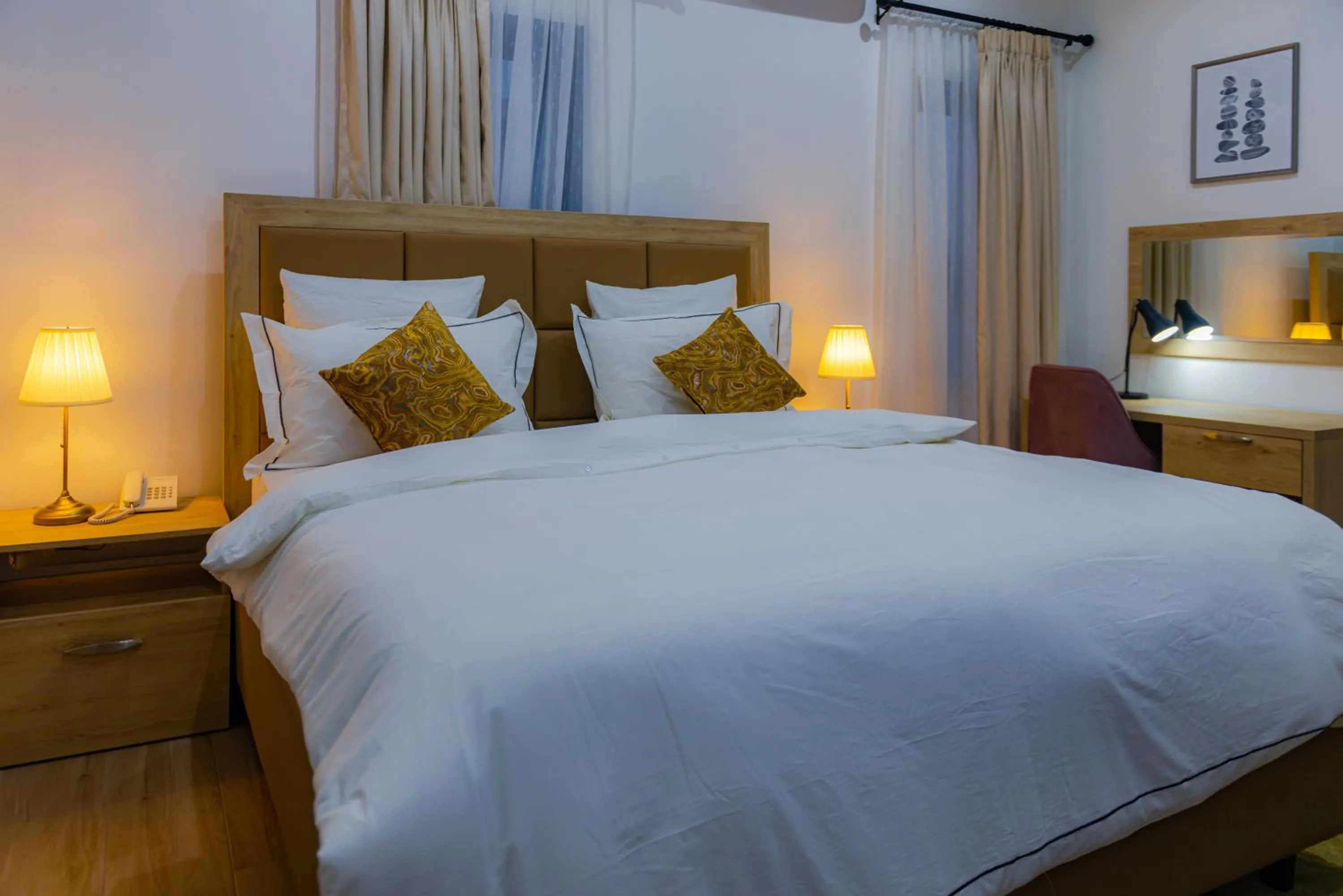 Bed in Quest Boutique Hotel
