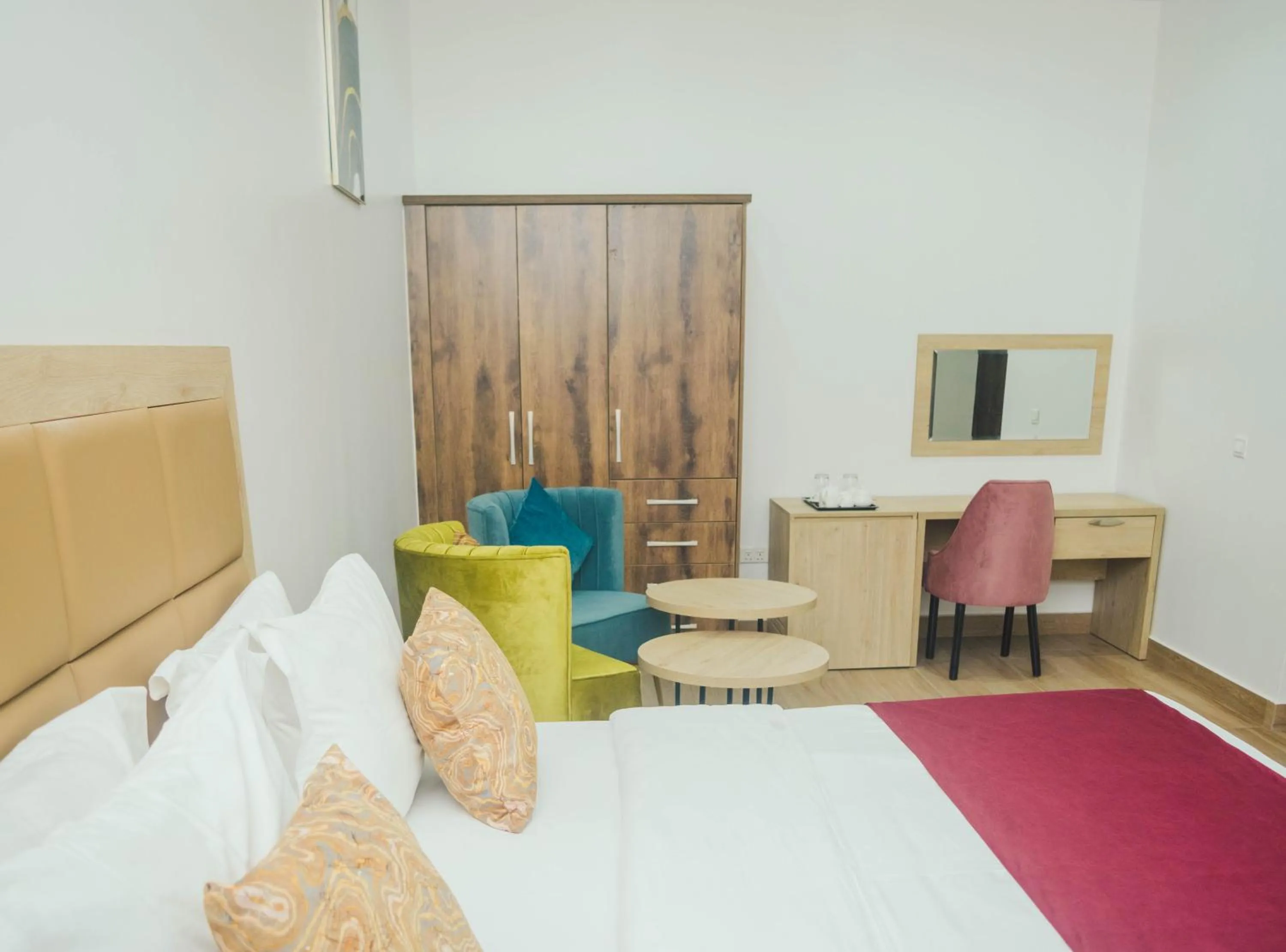 Communal lounge/ TV room, Bed in Quest Boutique Hotel