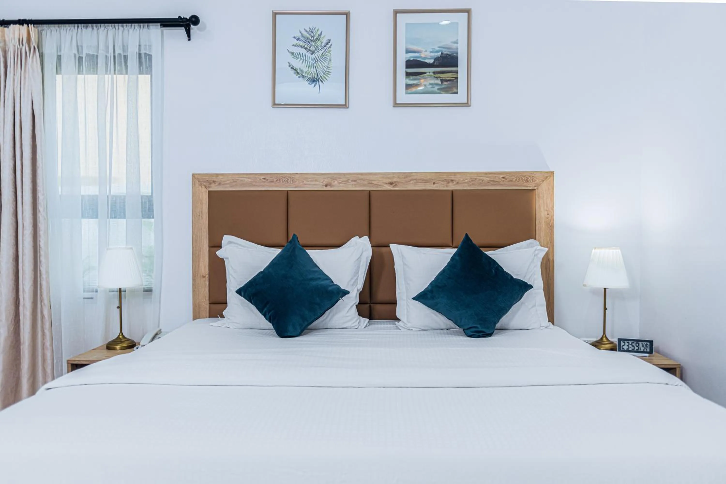 Bed in Quest Boutique Hotel