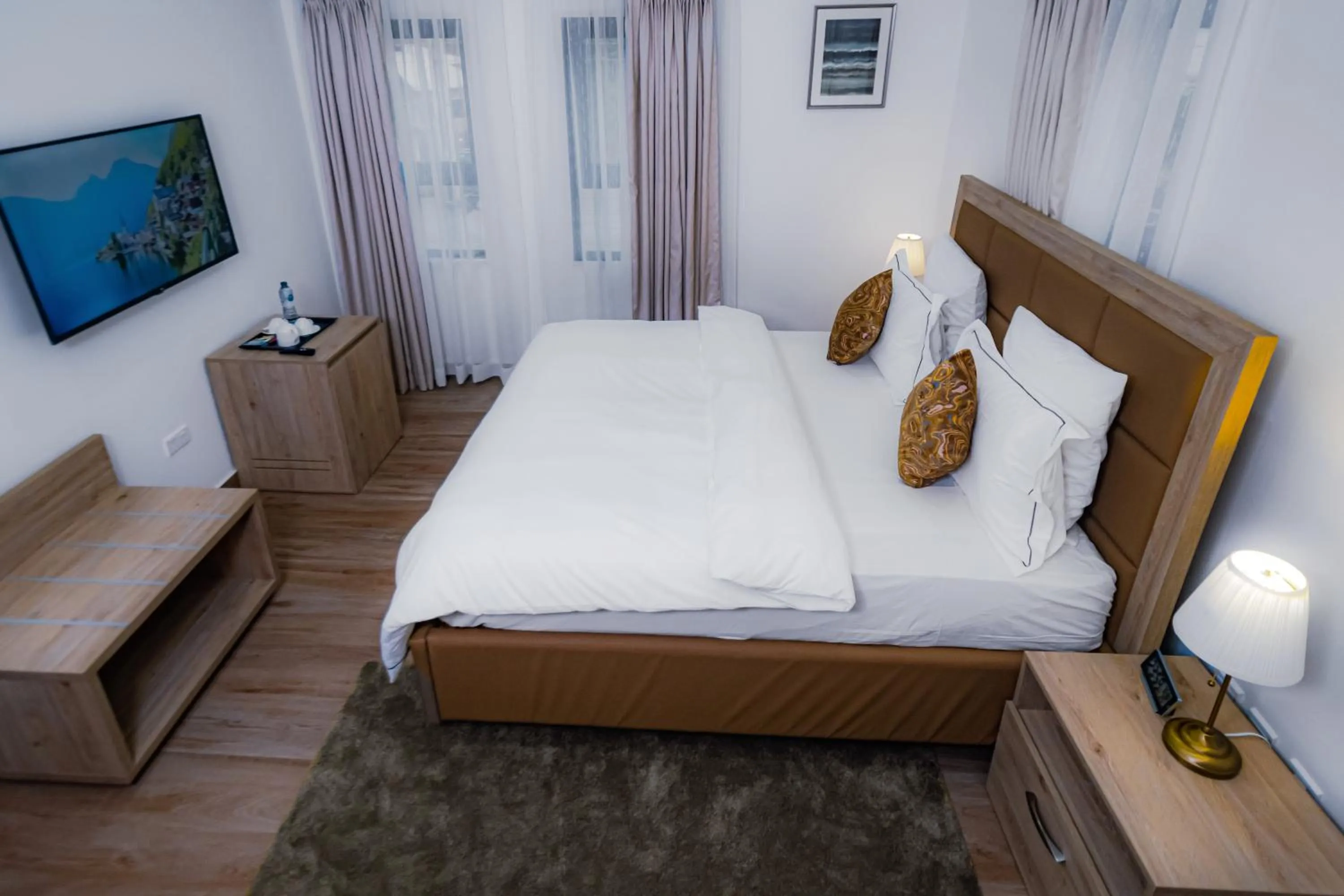 Bed in Quest Boutique Hotel