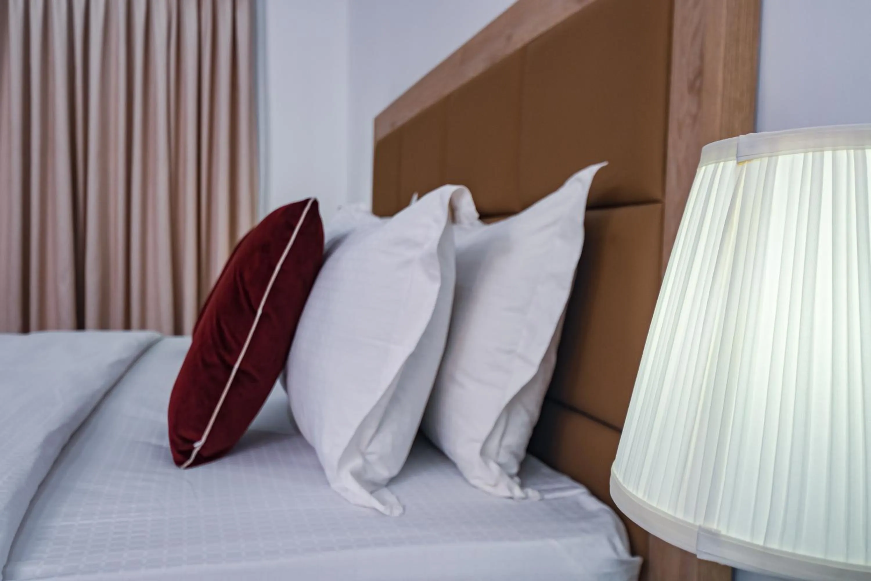 Bed in Quest Boutique Hotel