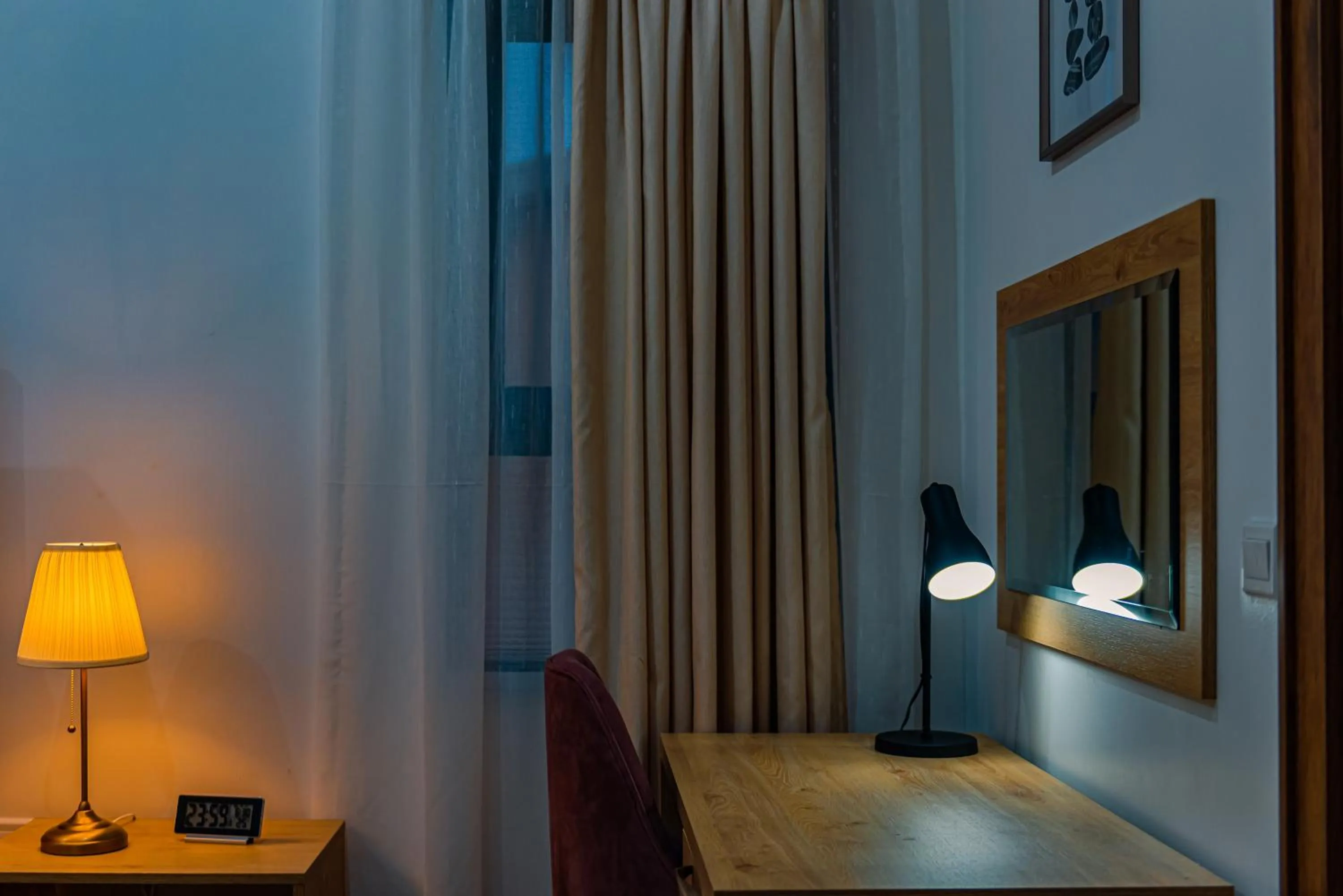 Bed in Quest Boutique Hotel