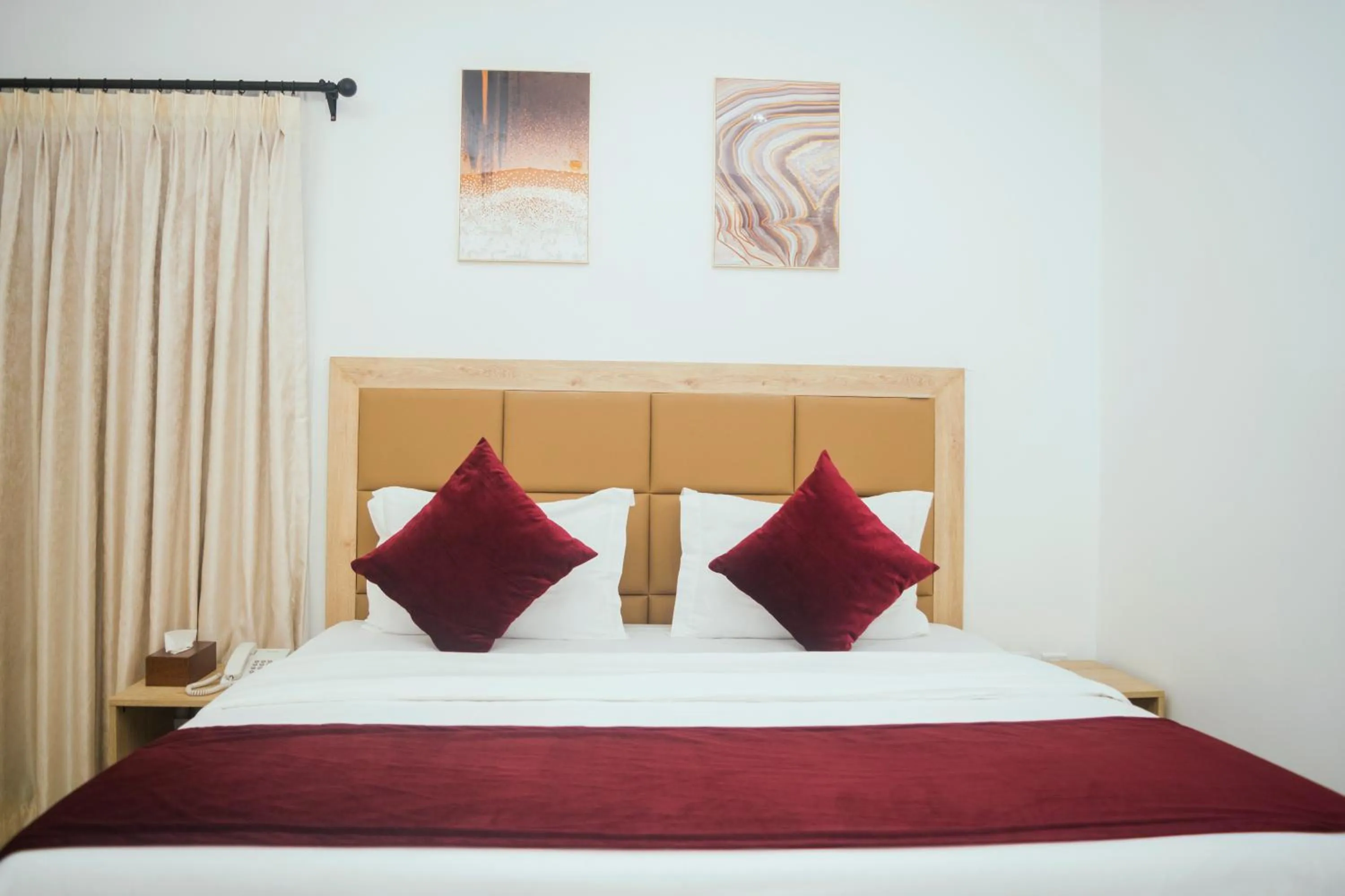 Bed in Quest Boutique Hotel