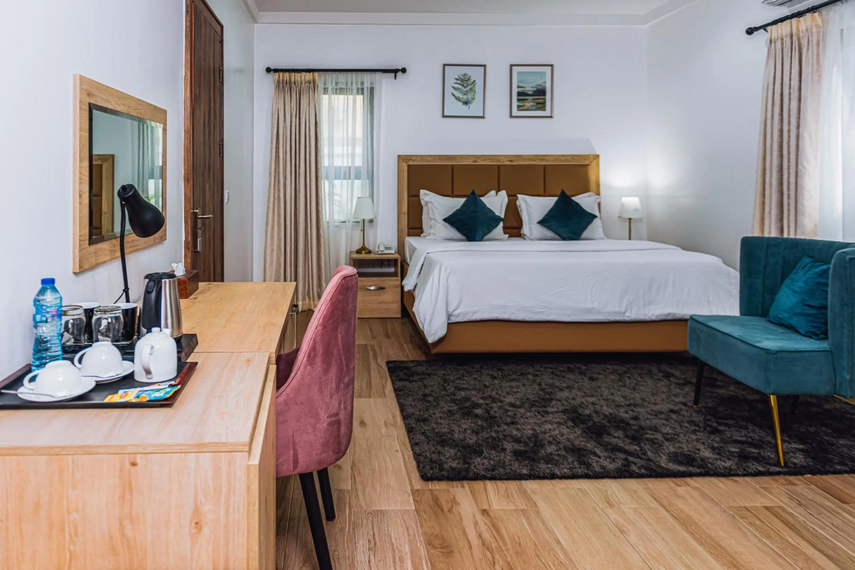 Bed in Quest Boutique Hotel