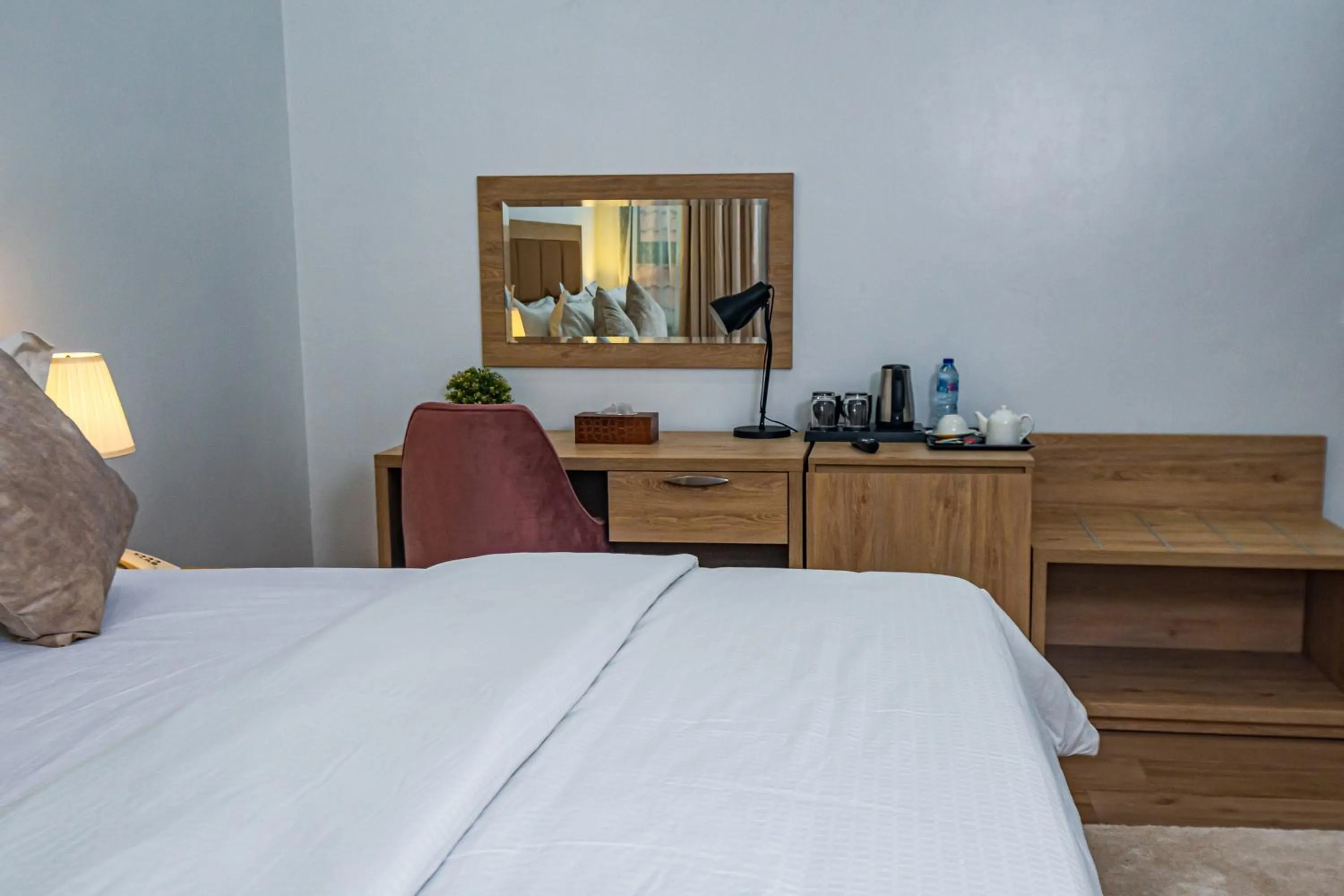 Bed in Quest Boutique Hotel