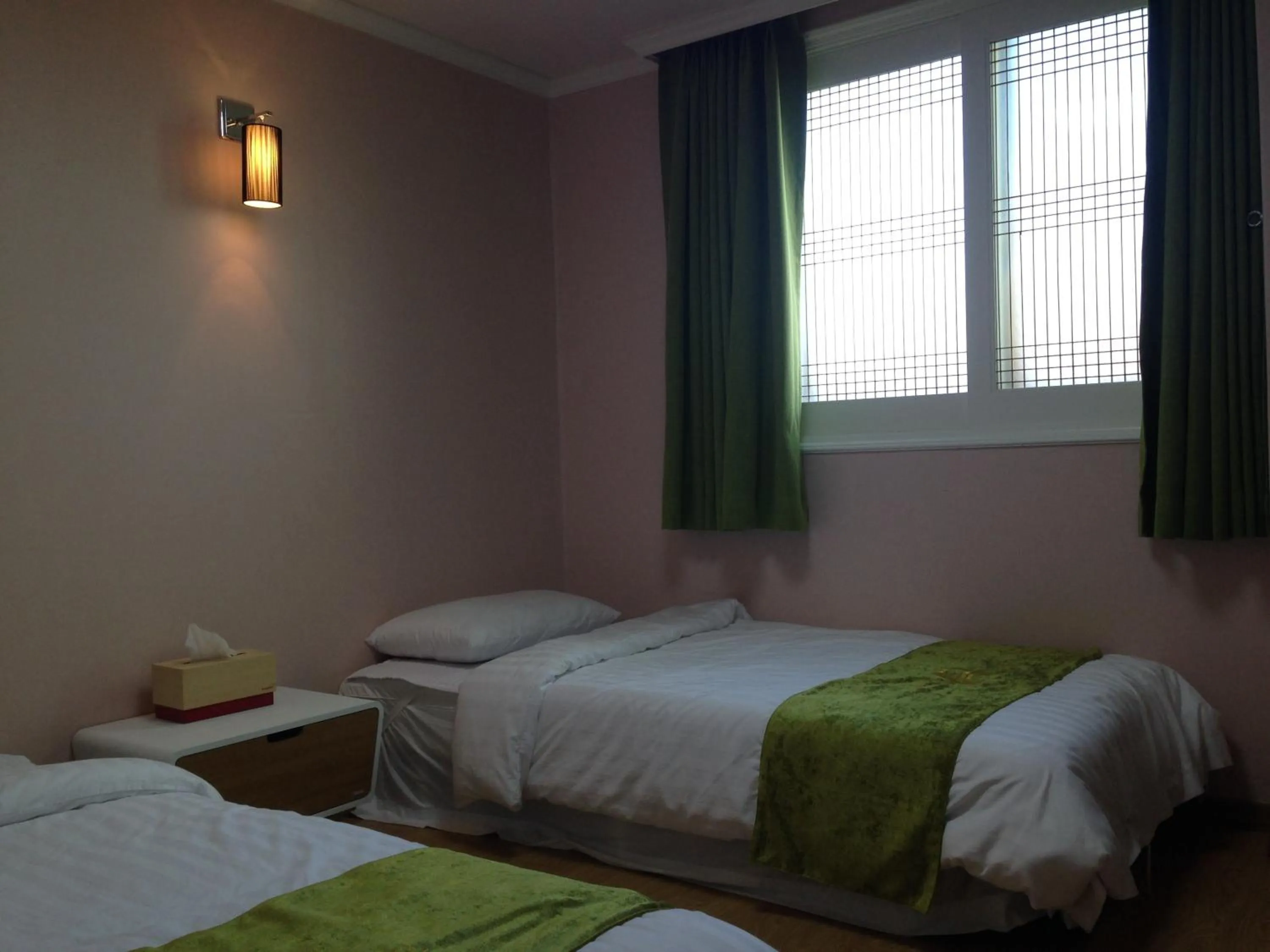 Decorative detail, Bed in Jeju R Hotel & Guesthouse