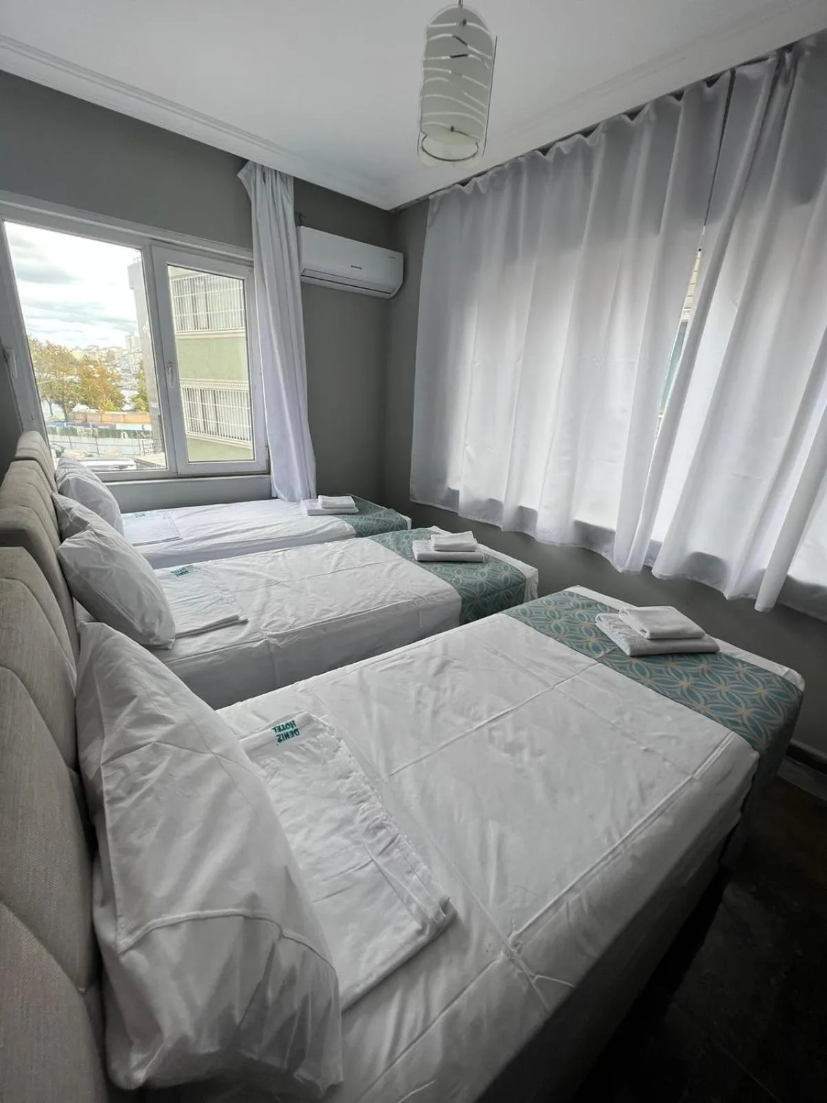 Bed in GRAND Deniz Hotel