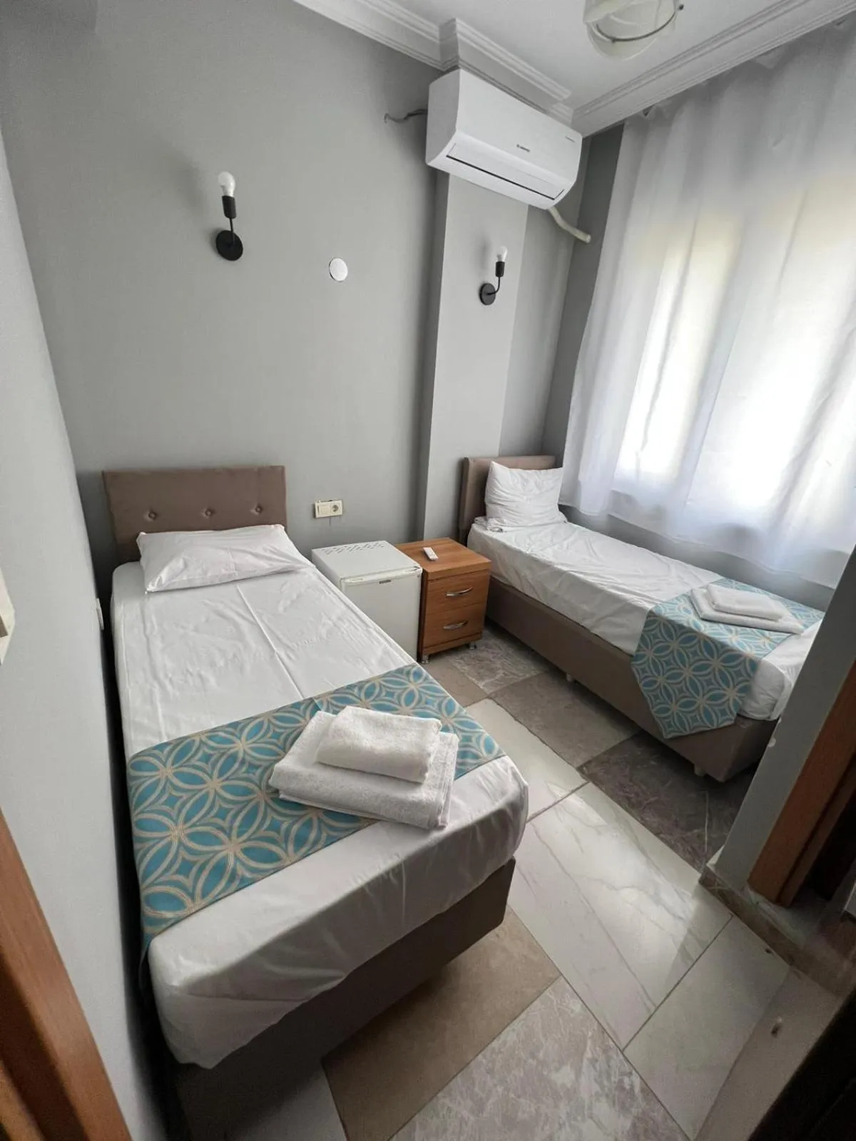 Bed in GRAND Deniz Hotel