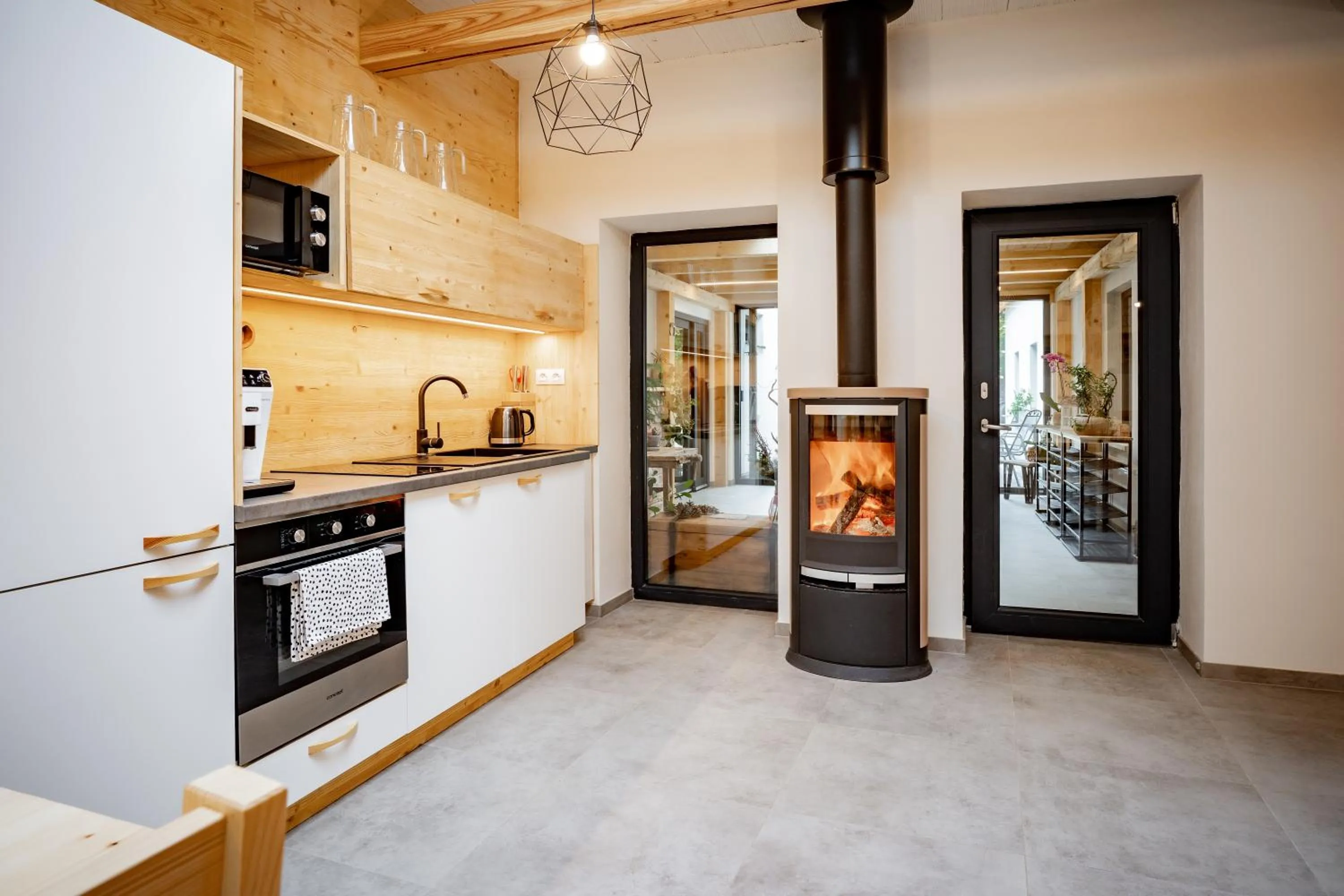 Communal lounge/ TV room in Apartmány NONE