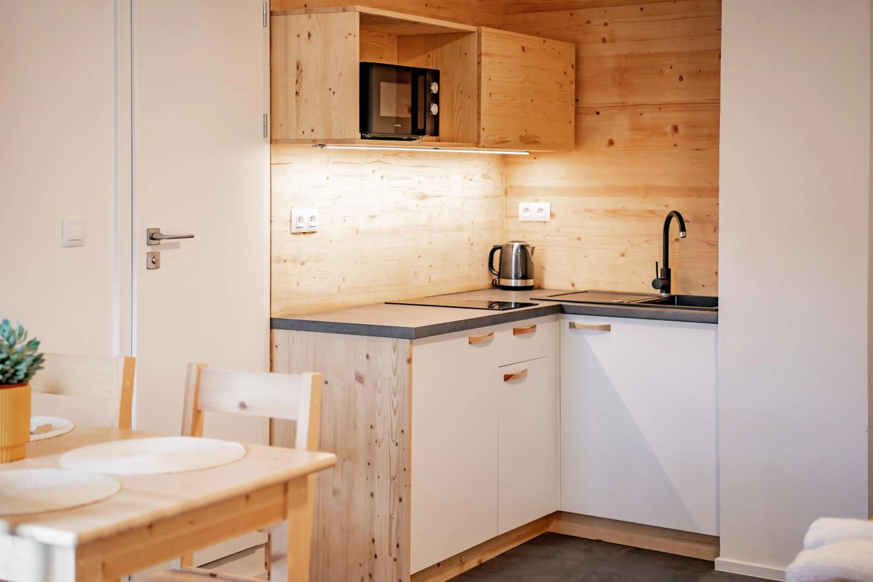 Kitchen or kitchenette in Apartmány NONE