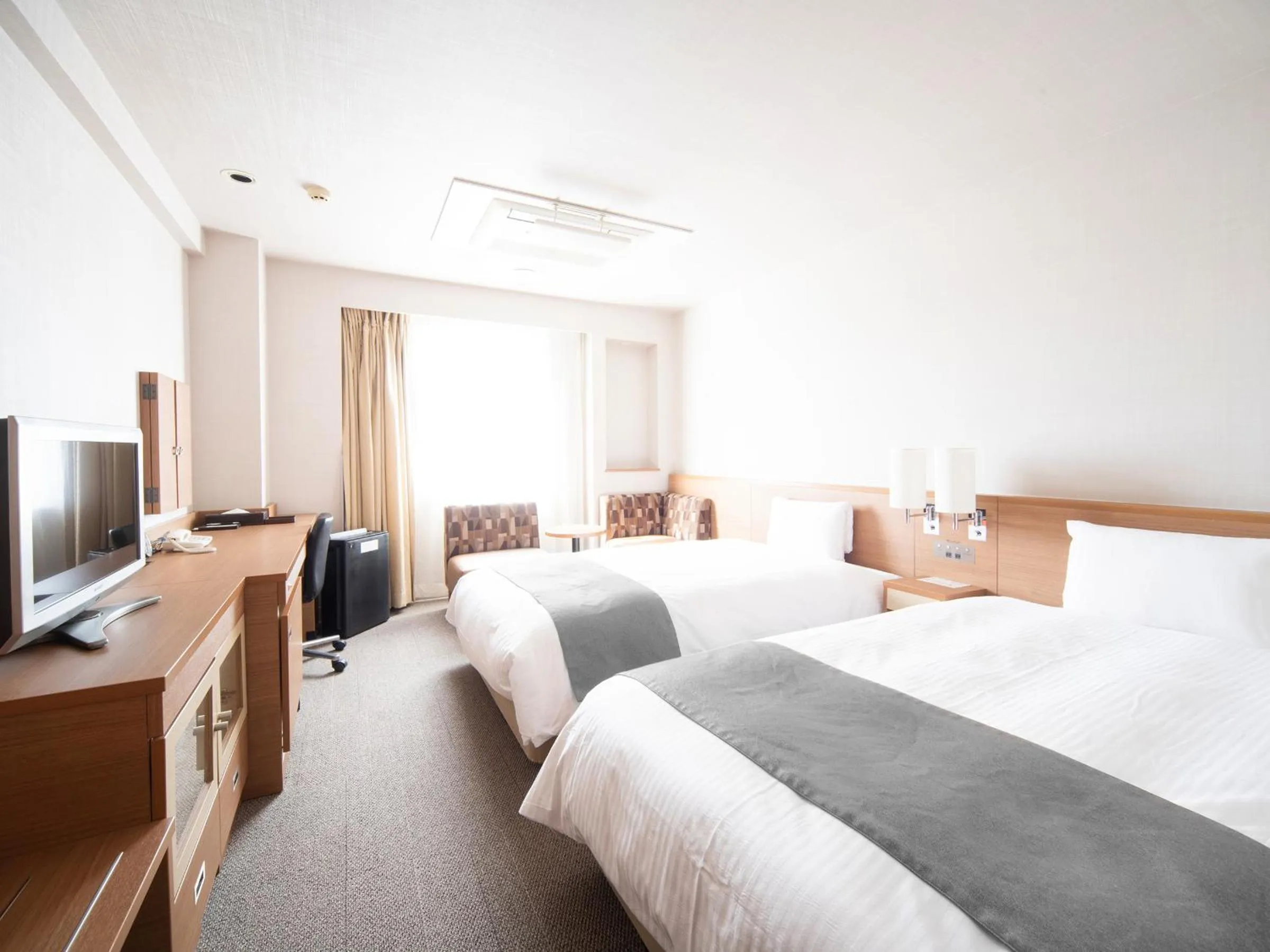 Bed in Vessel Inn Fukuyama Station