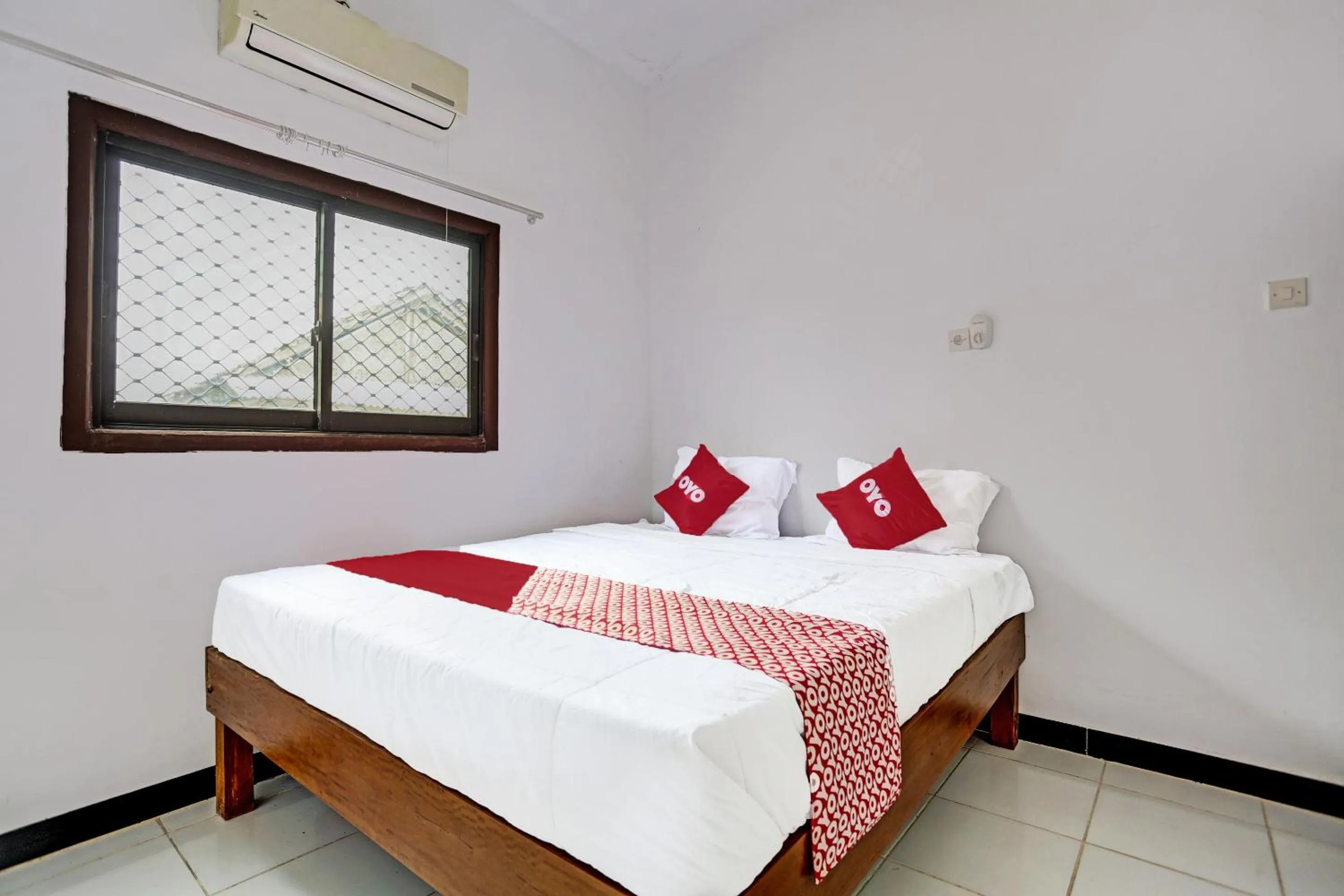 Bedroom in OYO 91773 Ab Homestay