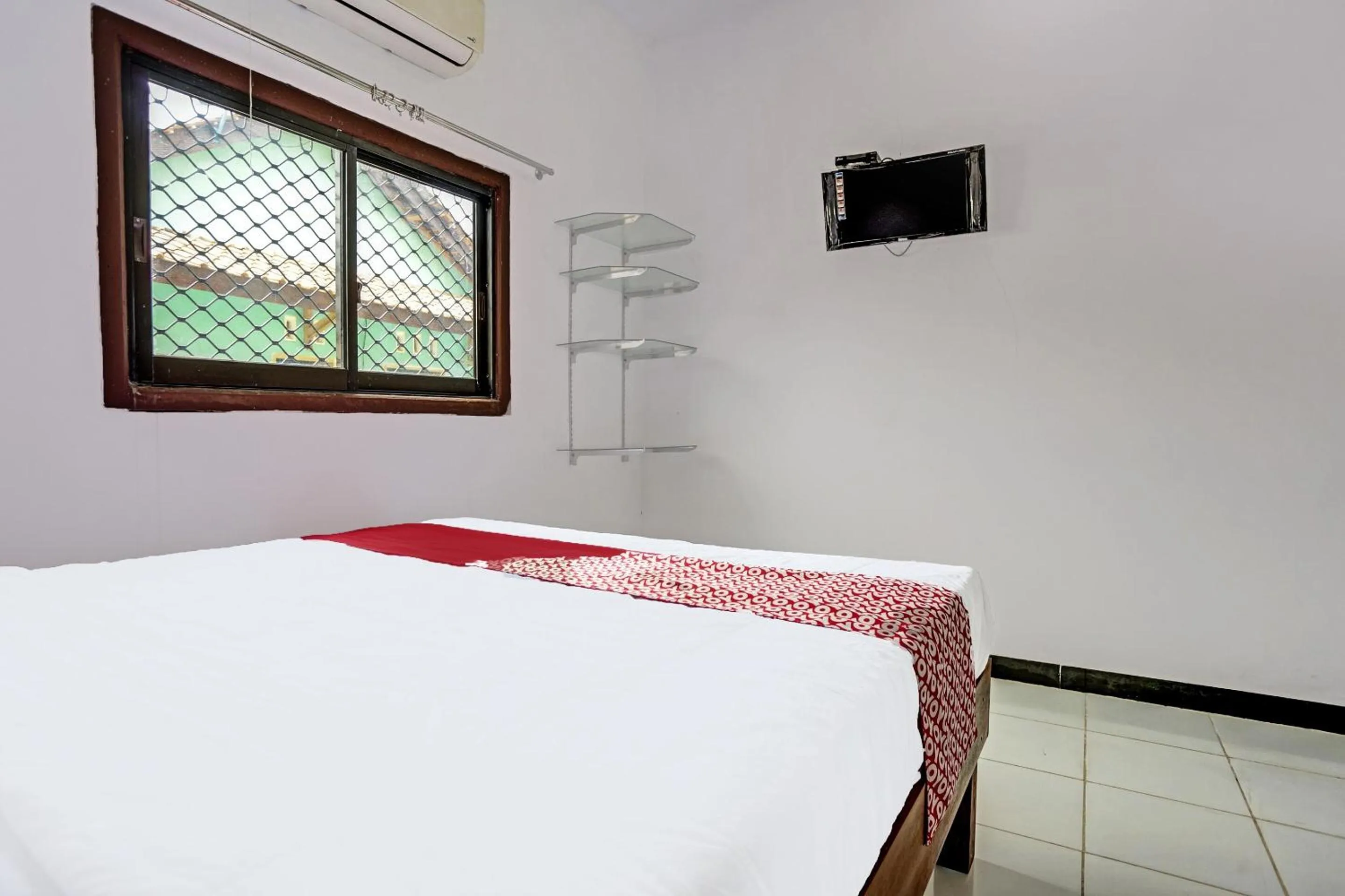 Bedroom in OYO 91773 Ab Homestay