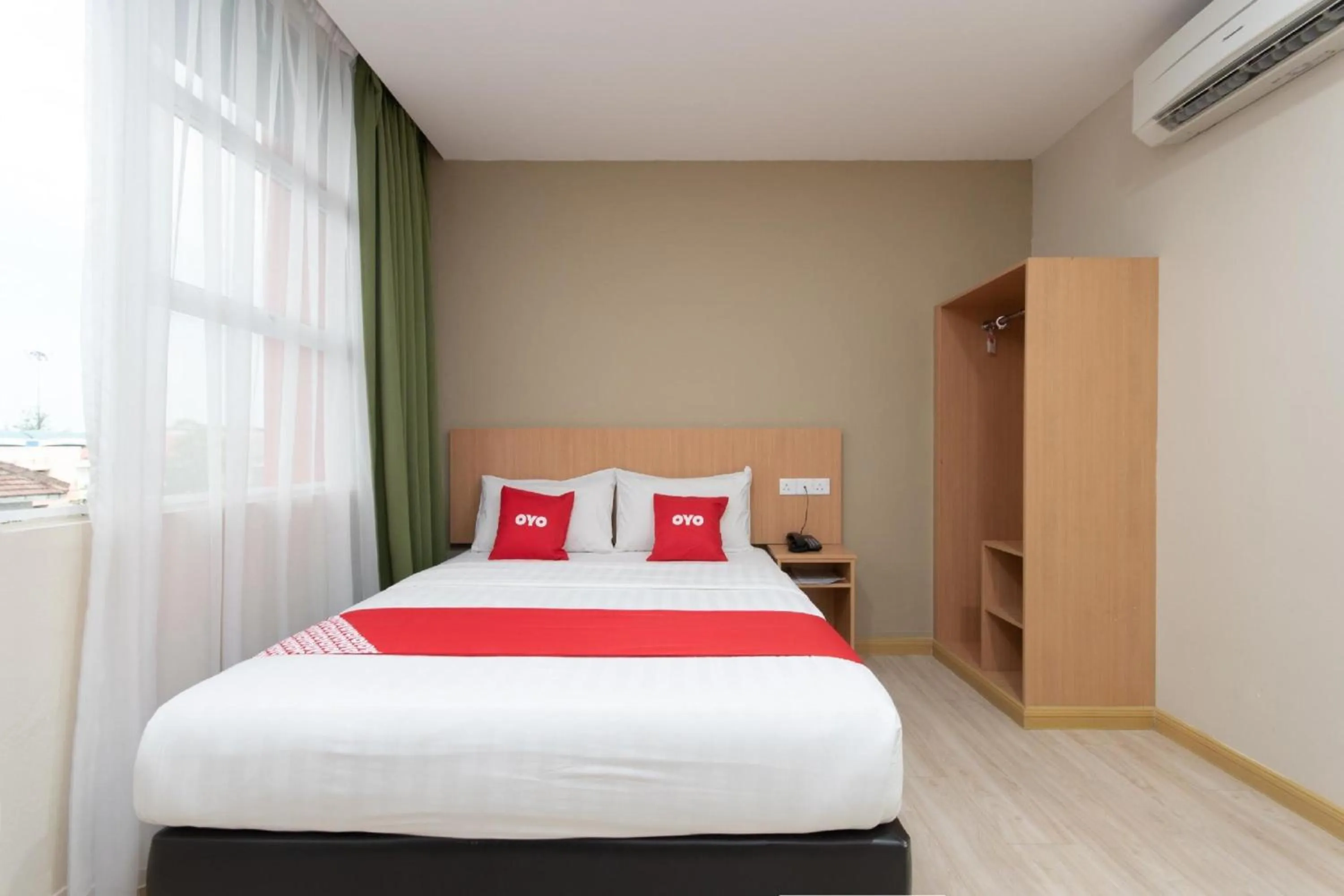 Photo of the whole room in Capital O 89344 Labuan Avenue Hotel