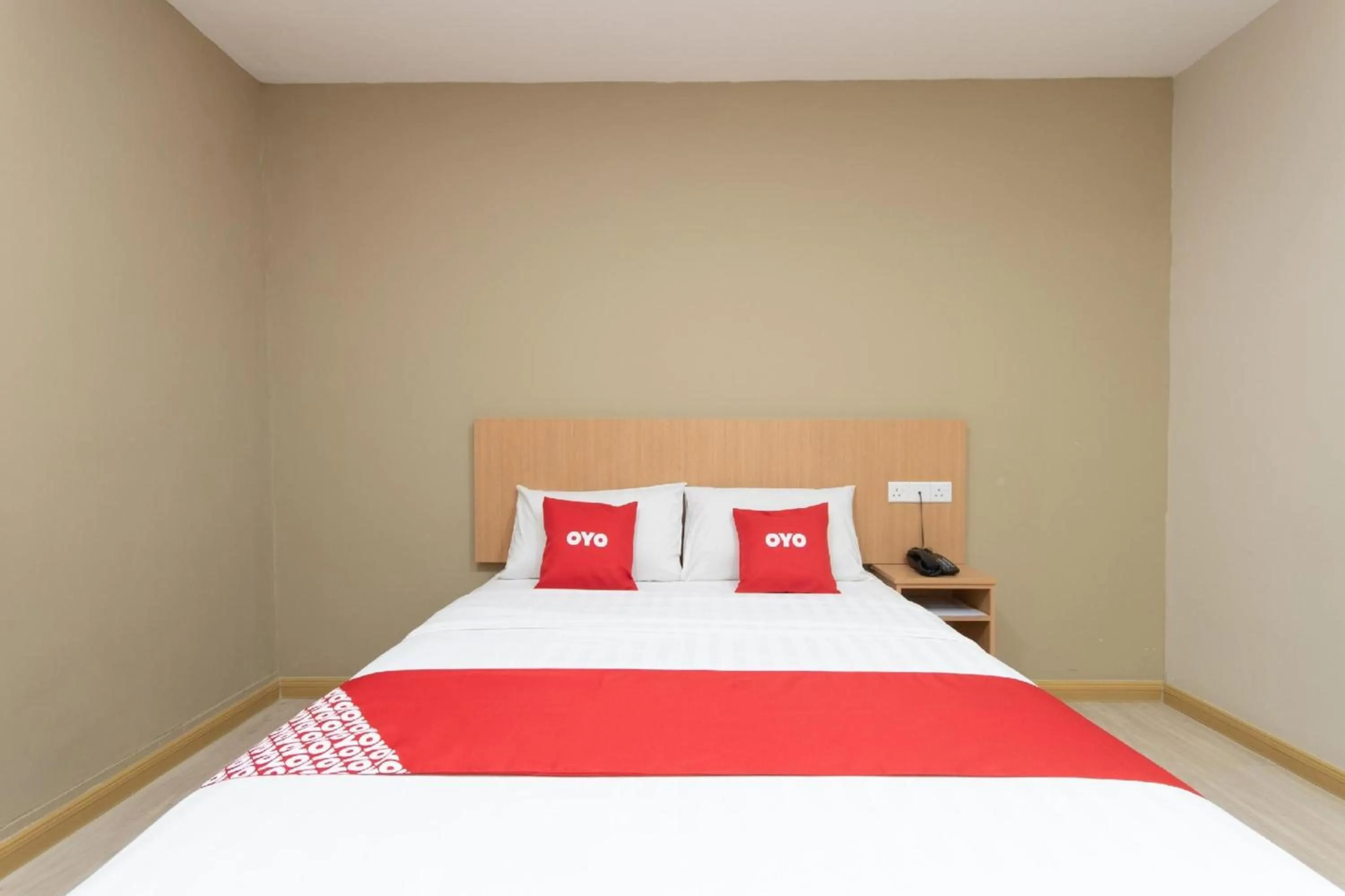 Bedroom in Capital O 89344 Labuan Avenue Hotel