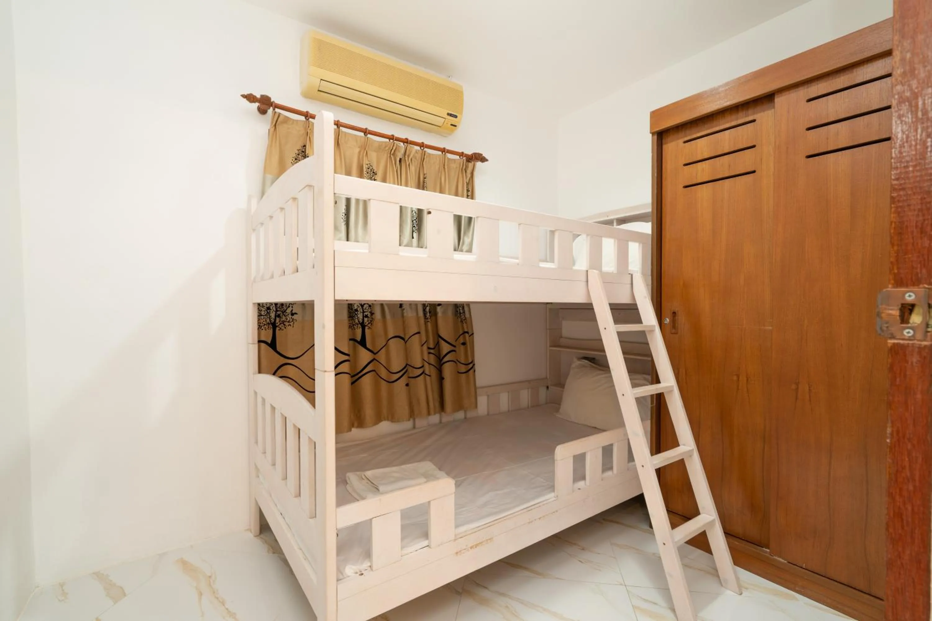 Bed in Sai Rougn apartment