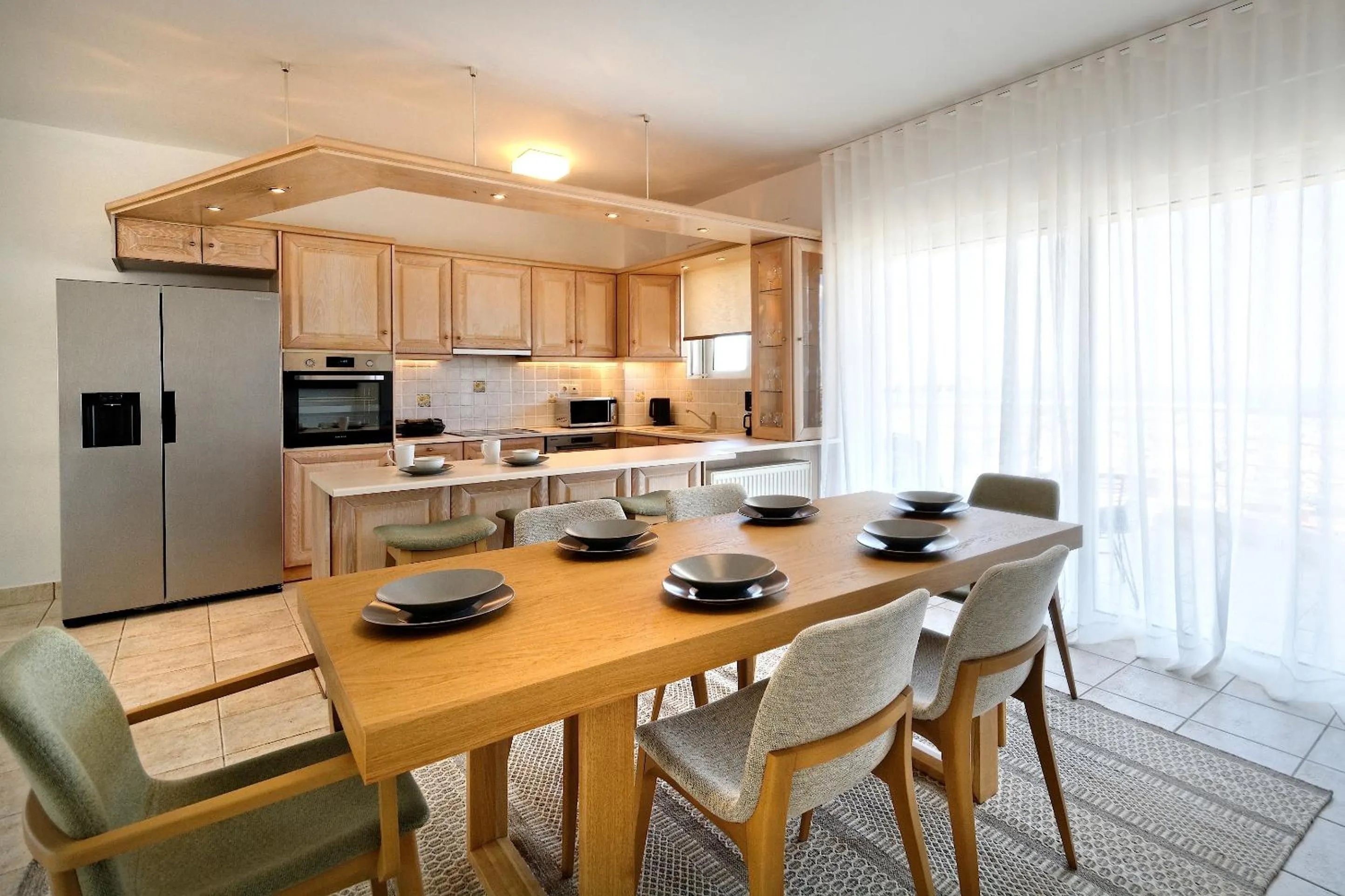 Kitchen or kitchenette in Triplex Villa Gardenia Glyfada sea view