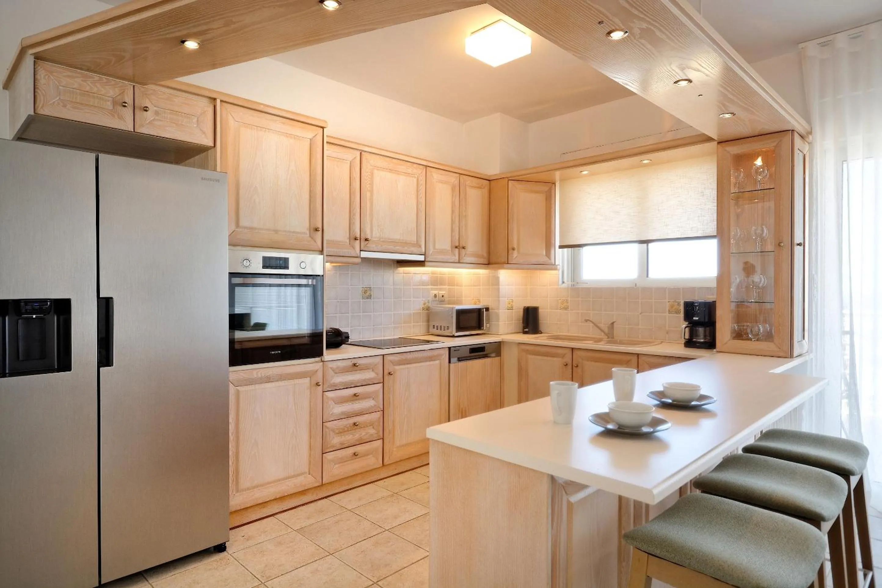 Kitchen or kitchenette in Triplex Villa Gardenia Glyfada sea view