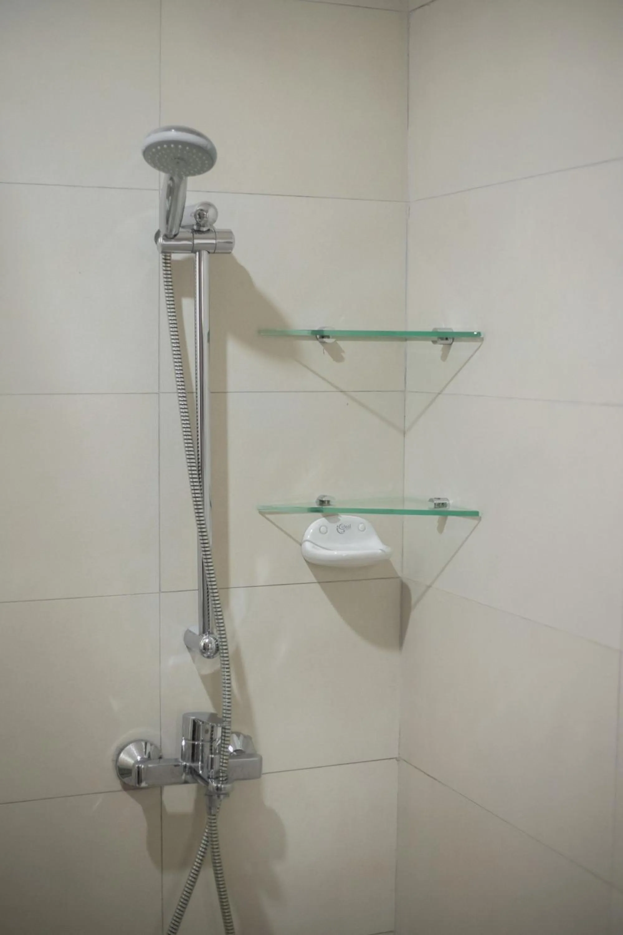 Bathroom in Bragha Apartments And Hotel