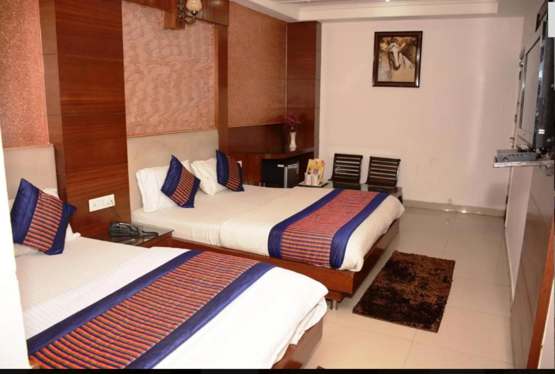 Photo of the whole room in Hotel Delhi Heart at New Delhi Railway Station