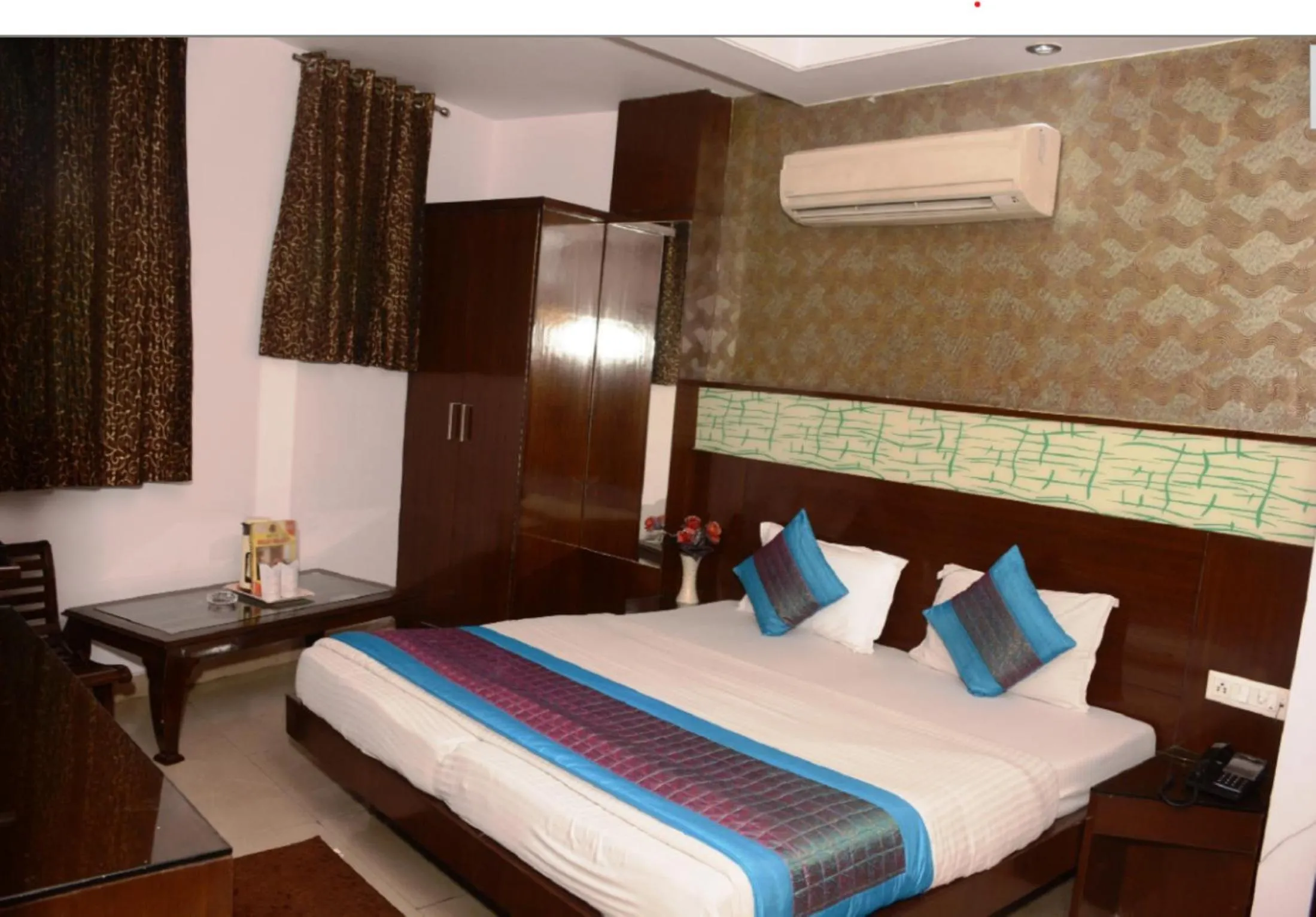 Photo of the whole room in Hotel Delhi Heart at New Delhi Railway Station