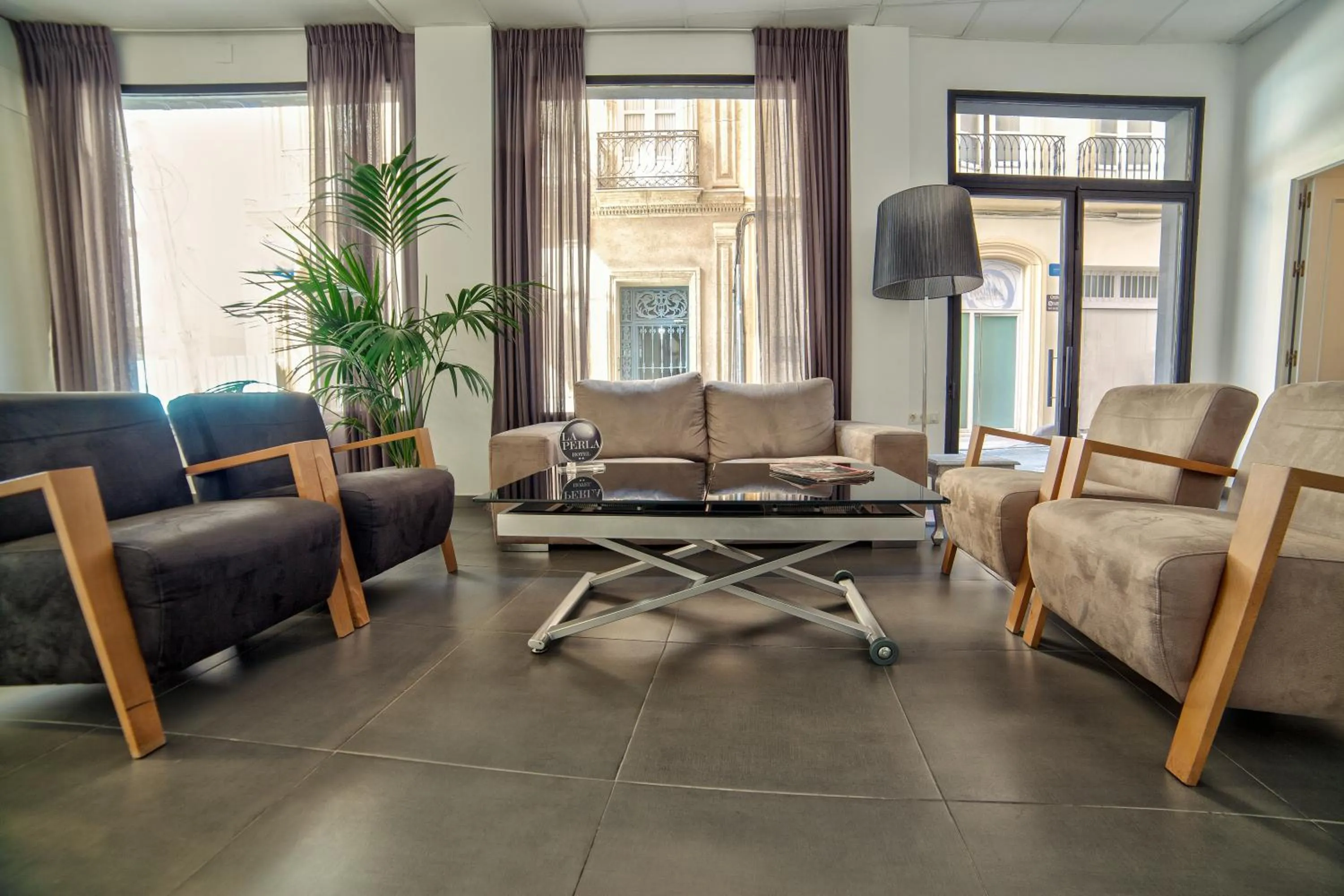 Communal lounge/ TV room in La Perla