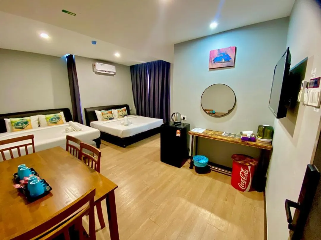 Bed in RNK BoutiQue HOTEL