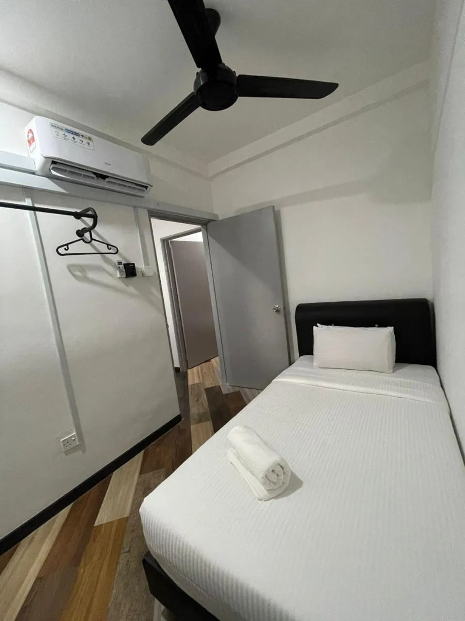 Bed in RNK BoutiQue HOTEL