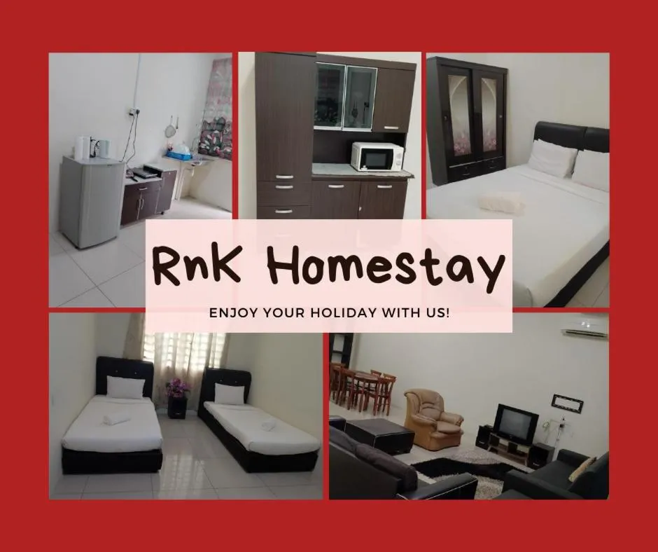 Bed in RNK BoutiQue HOTEL