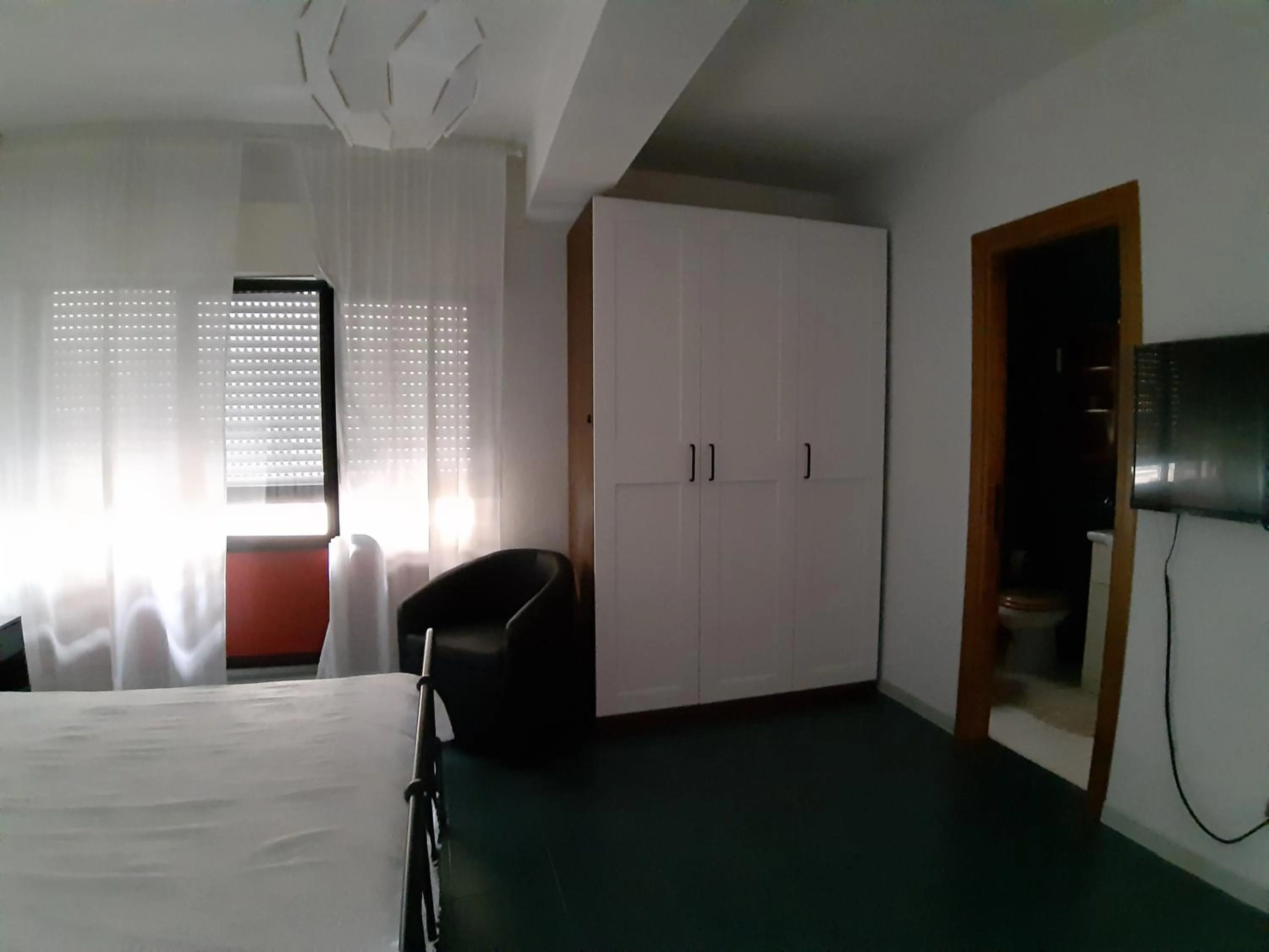 wardrobe, Bed in Spazioso appartamento sul lungomare di Nettuno