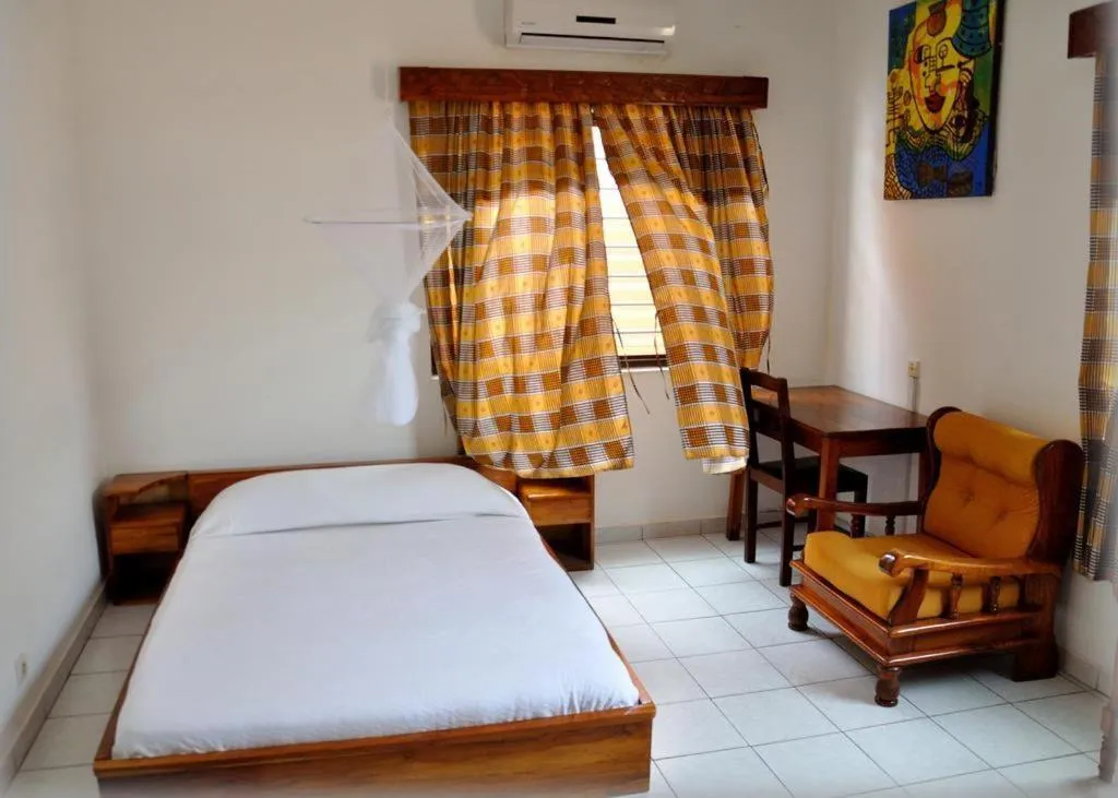 Photo of the whole room, Bed in Hotel Aurore Lomé